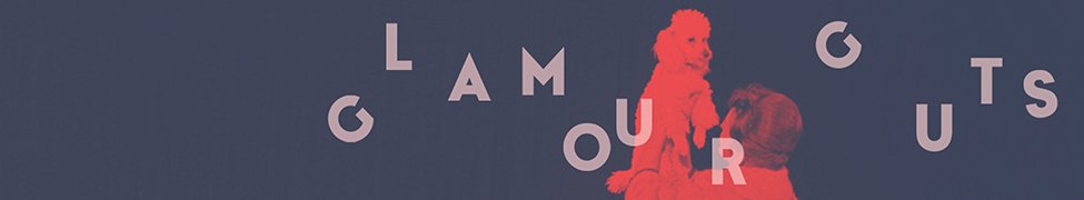 The image features the phrase "Glamour Guts" with a person in red attire and another person in front of them. The text is scattered across the banner, with the word "Glamour" at the top and "Guts" at the bottom.