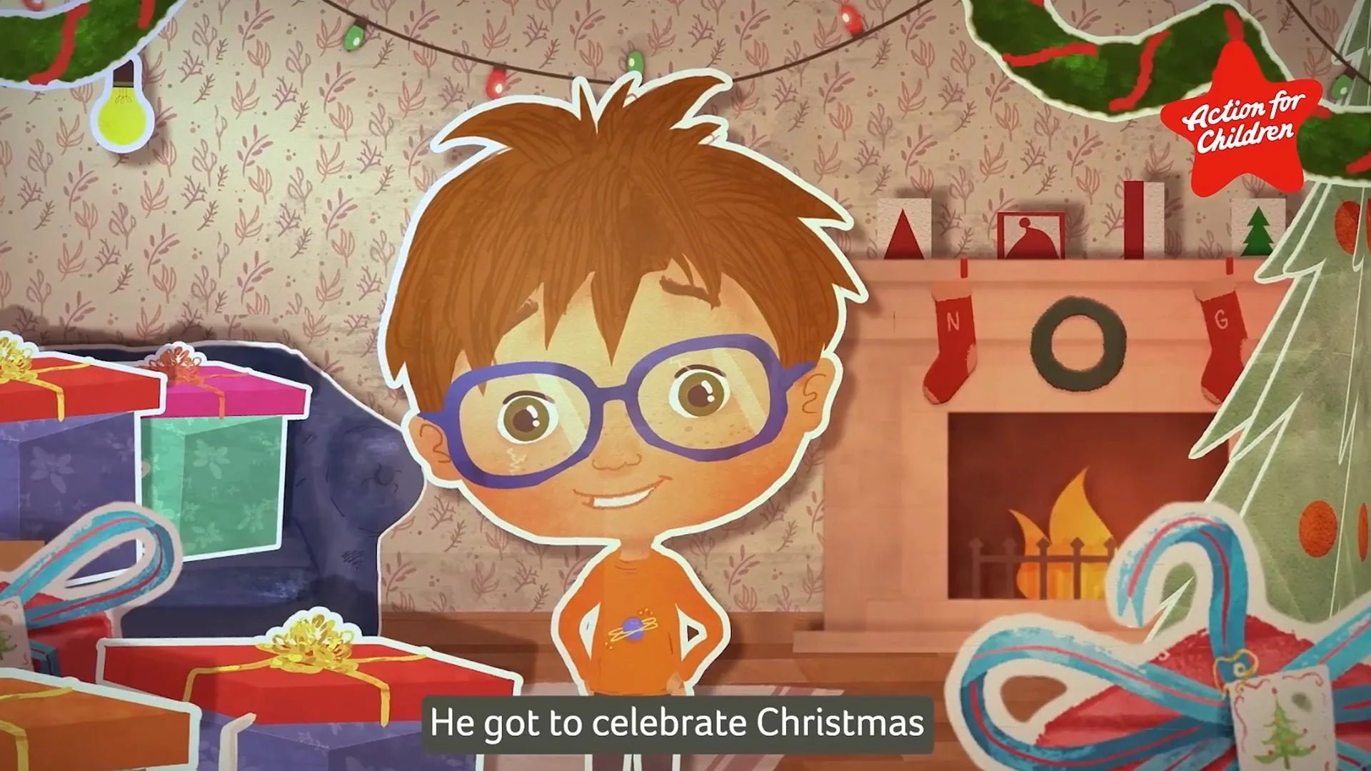 A cartoon illustration of a young boy with brown hair, glasses, and freckles, smiling in front of a Christmas fireplace decorated with stockings and a wreath. There are presents, ribbons, and Christmas lights around him, with the caption 'He got to c
