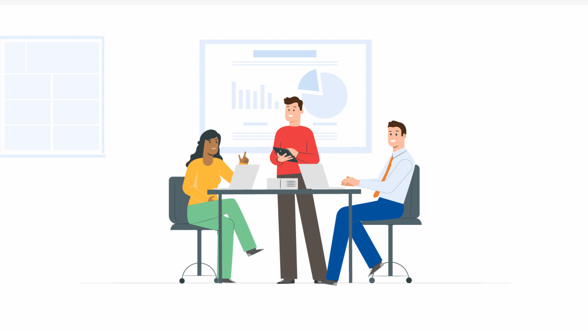 Three people in a meeting room with a presentation board displaying charts. One woman seated with a laptop, a man standing holding a tablet, and another man seated with a laptop.
