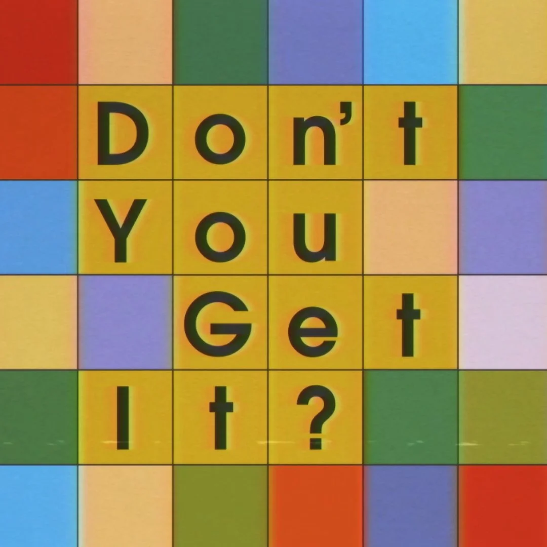 Colorful puzzle that spells out "Don't you get it?" with each word on a separate line, surrounded by multicolored tiles.