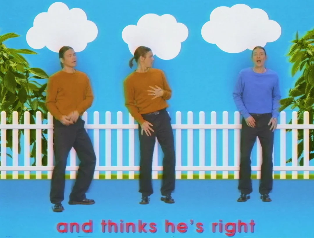 Three people standing in front of a colorful background with clouds and plants, with text that reads 'and thinks he's right'.