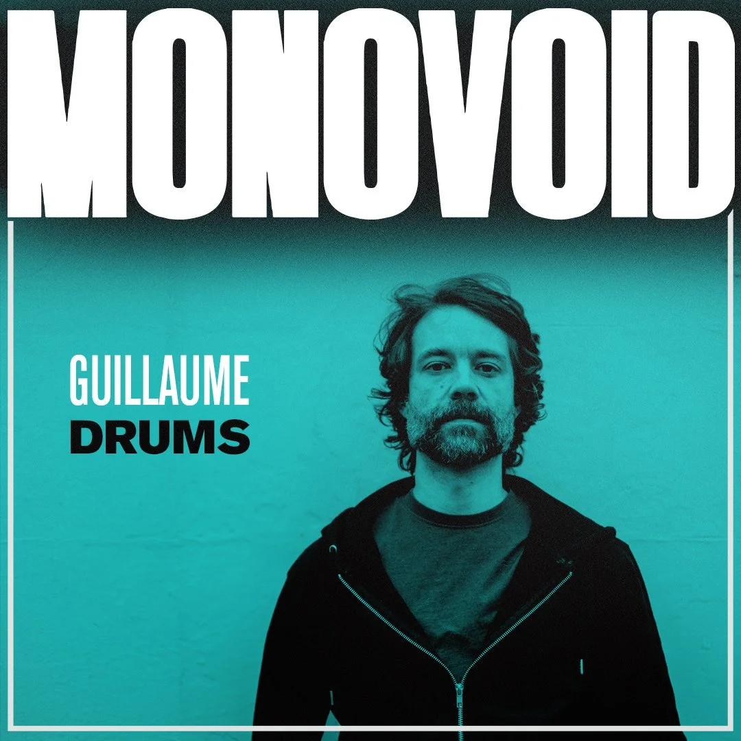 Album cover with large white text that says 'MONOVOID' at the top. A man with dark, curly hair and a beard stands against a teal background. He wears a dark jacket over a gray shirt. The text 'GUILLAUME DRUMS' is written on the left side of the image.