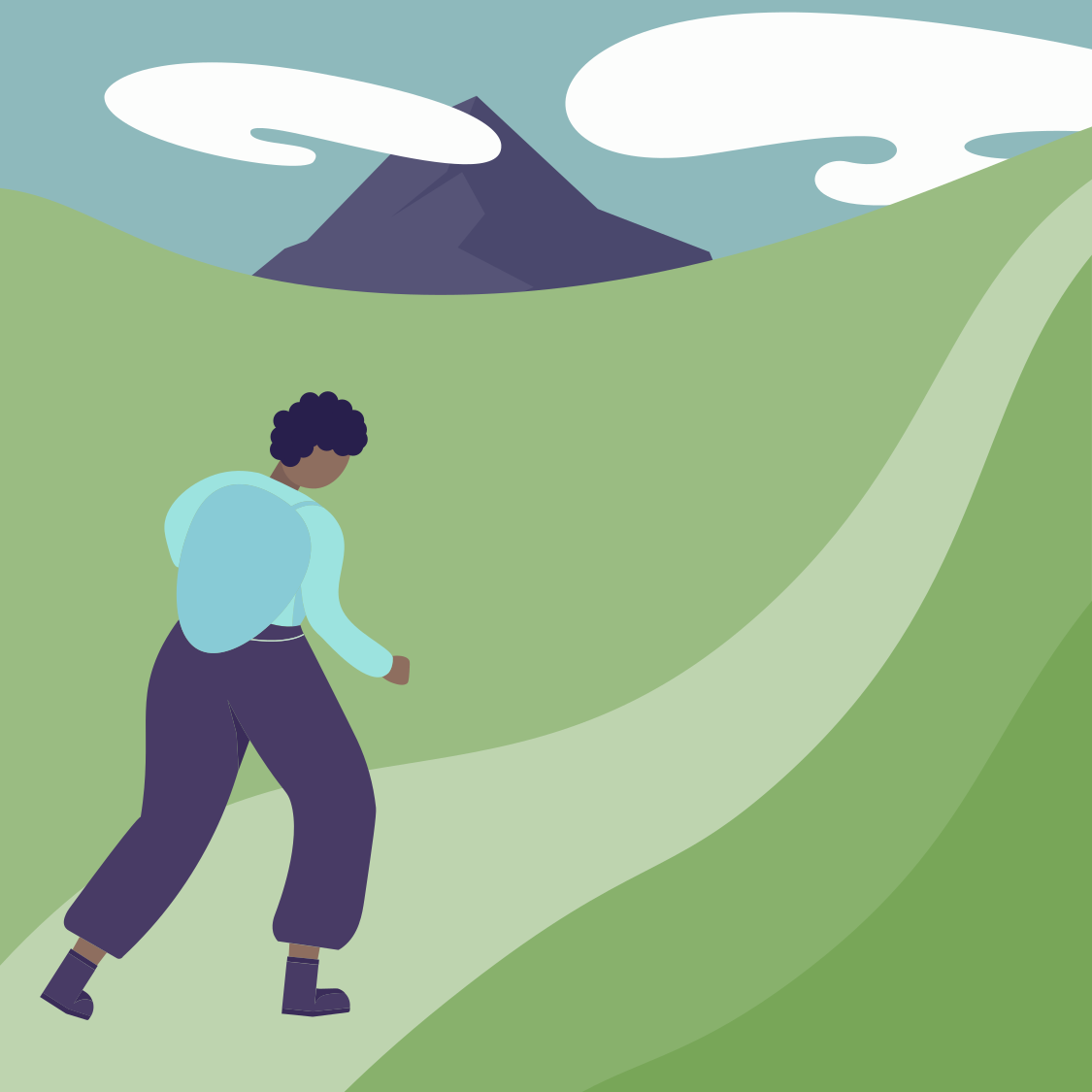 A person hiking on a winding path through grassy hills towards a mountain with clouds in the sky.