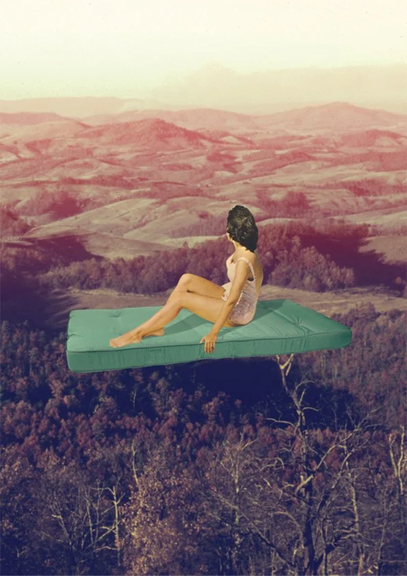 A woman sitting on a floating bed in a surreal landscape with rolling hills and trees.