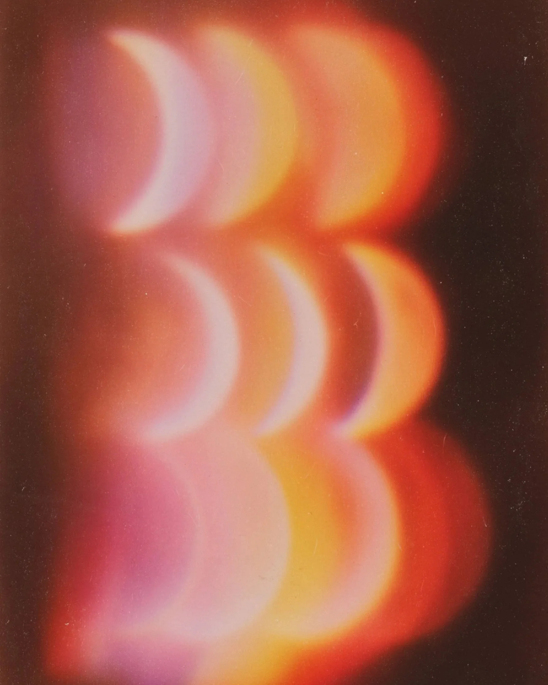 A cosmic scene with a large silhouette of a crescent moon and several glowing orange and red planets, set against a starry background.