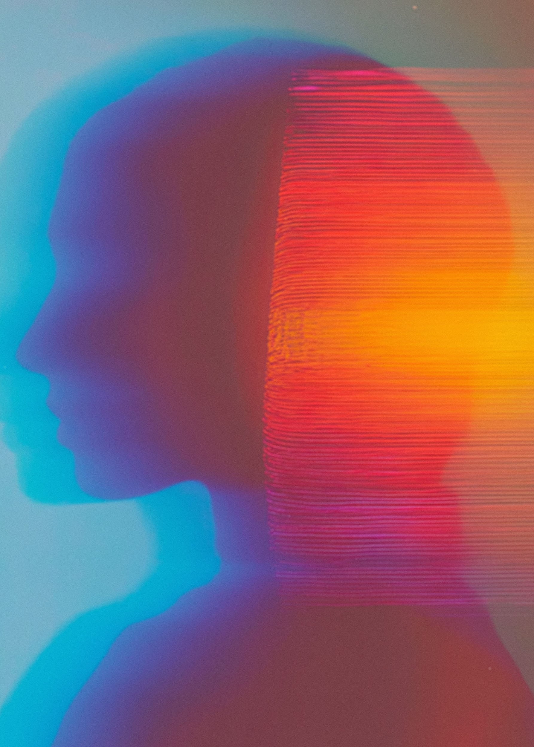 Abstract digital art with a profile silhouette of a person's head on the left, blending into vibrant, layered horizontal lines in warm colors on the right.
