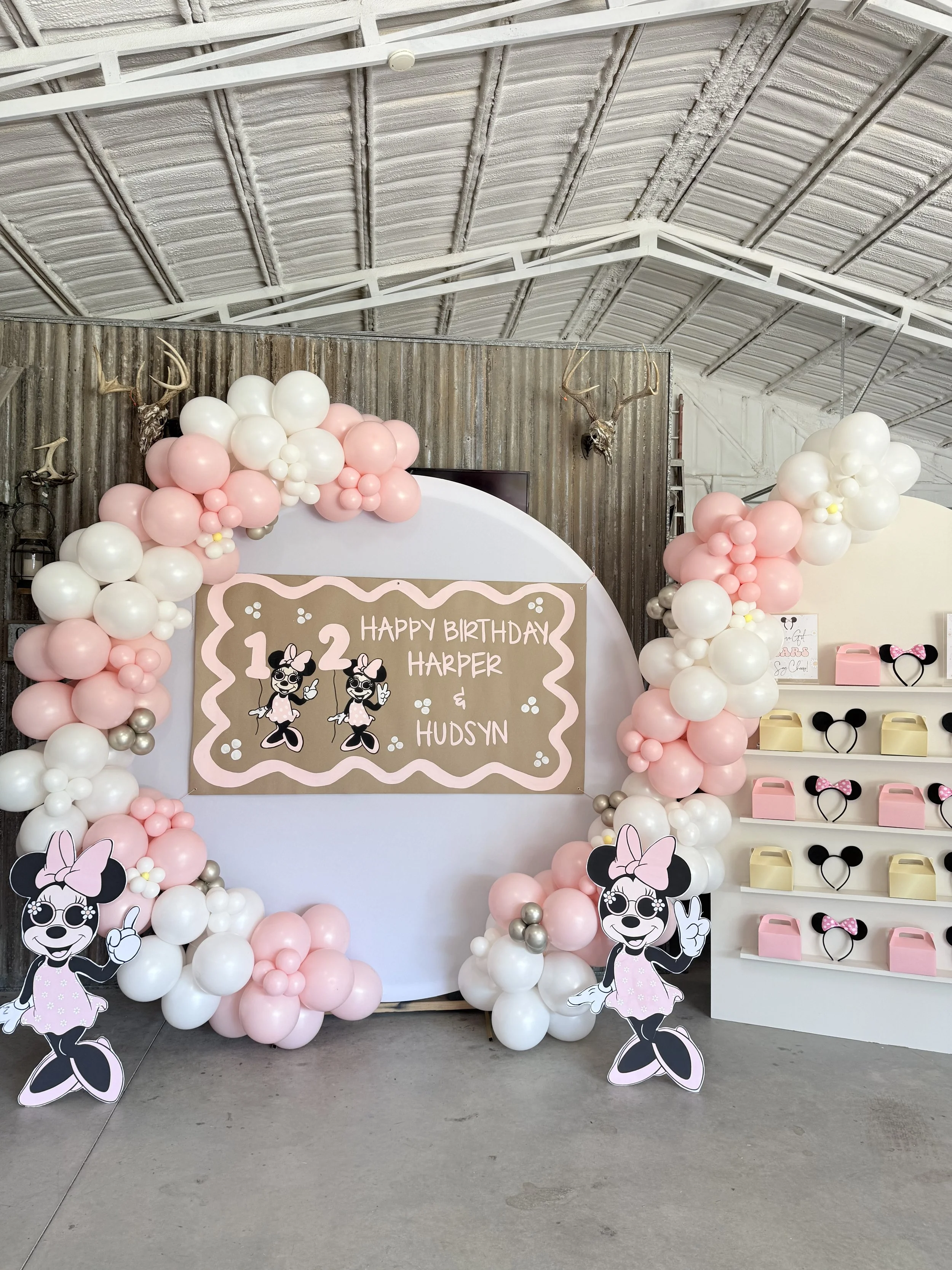 Essential Custom Balloon Installation with custom floral balloon add-on. Treat Wall Rental & Minnie Mouse Cutouts.