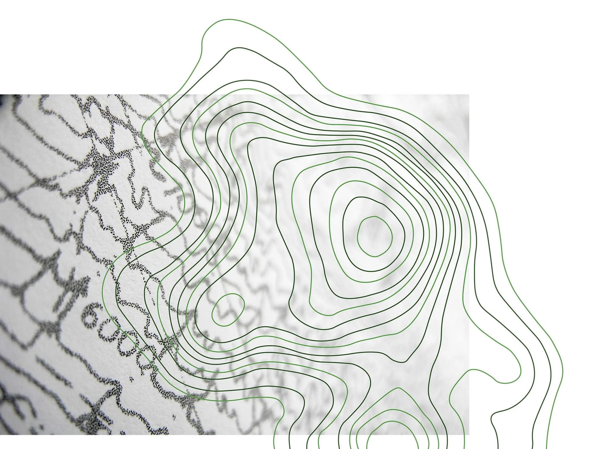 Close-up of a topographic map with black contour lines overlaying a white background, featuring fine detailed patterns and a textured surface.