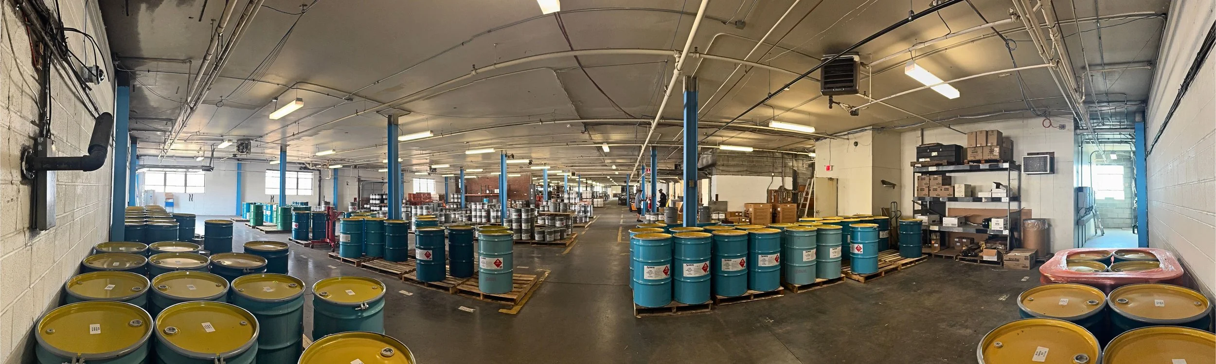 drums of paint in the warehouse