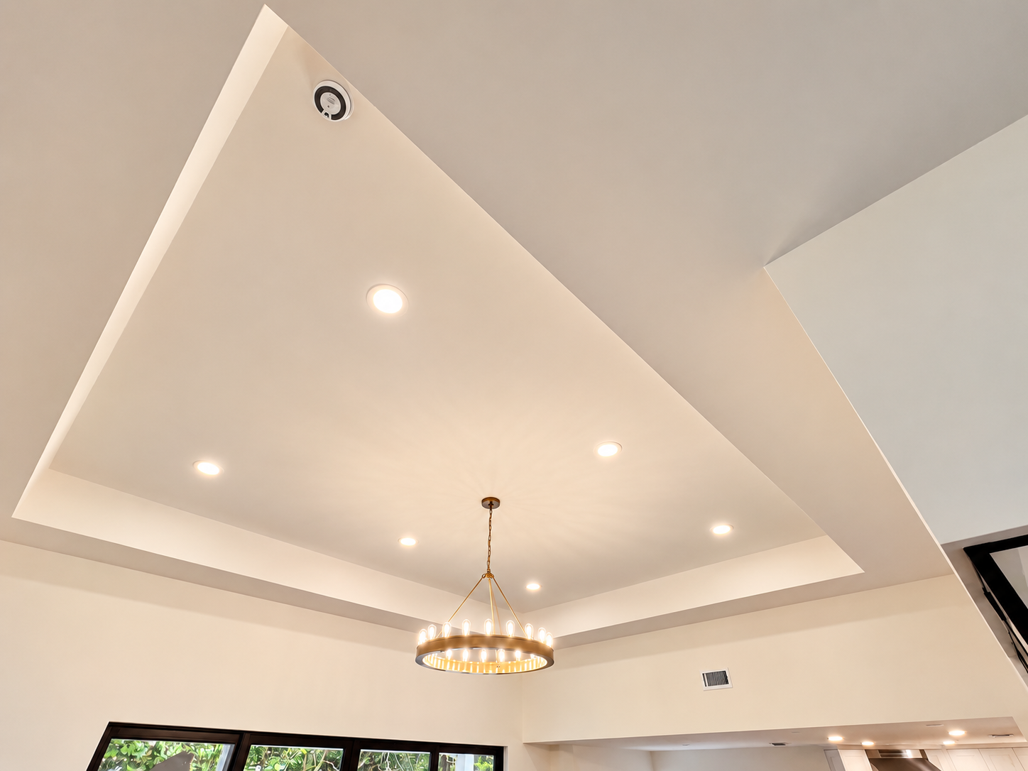 Ceiling with recessed lighting, a central chandelier, air vent, and crown molding