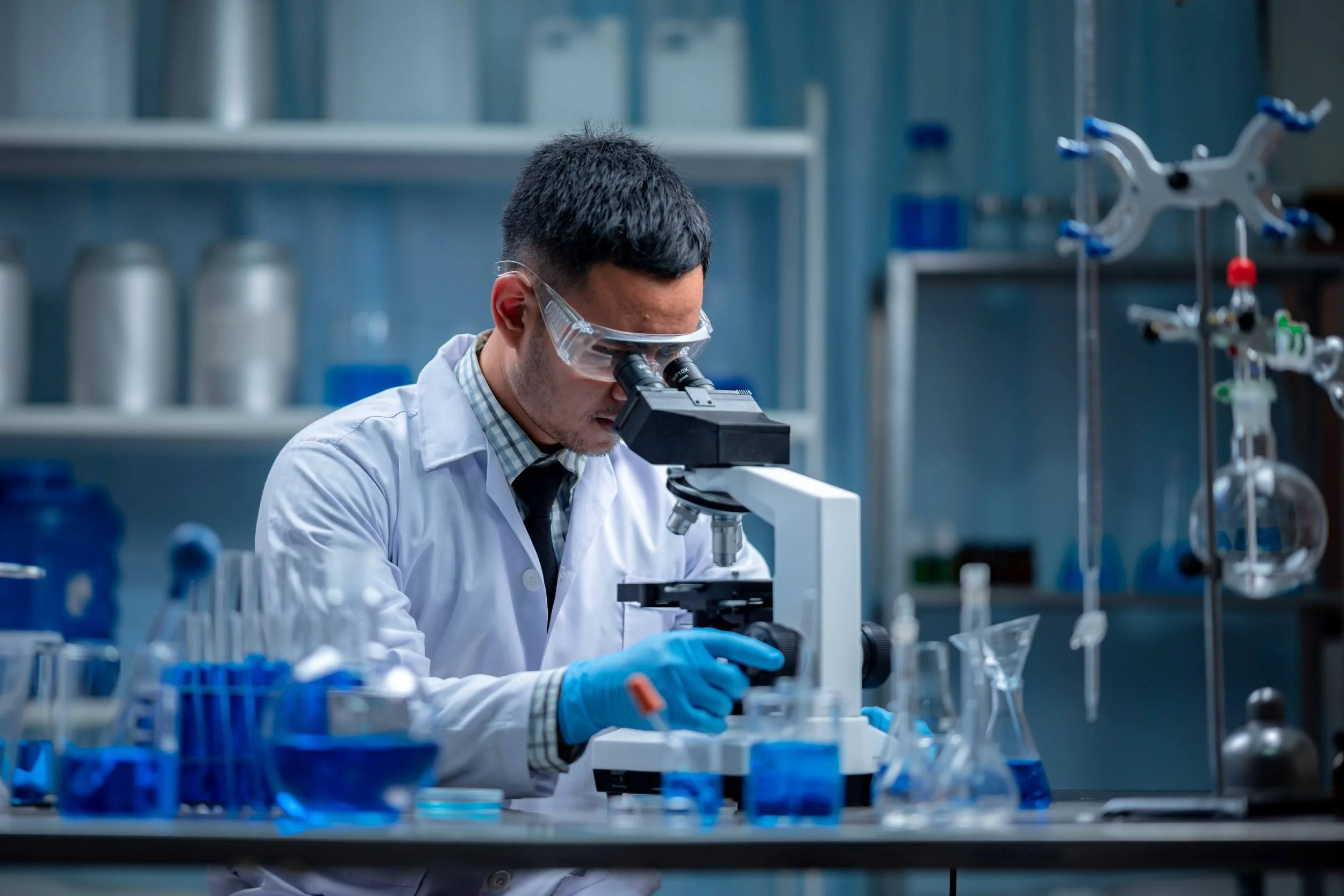 Chemist-researching-custom-industrial-metal-surface treatment chemicals