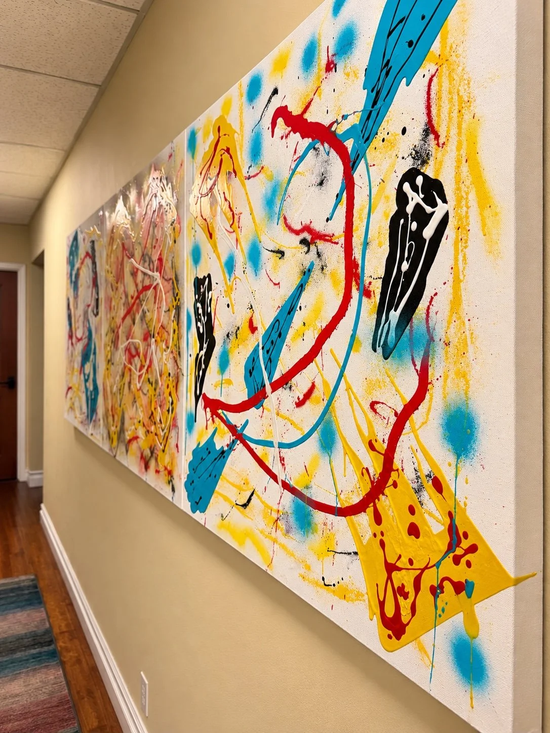 Colorful abstract artwork in the hallway