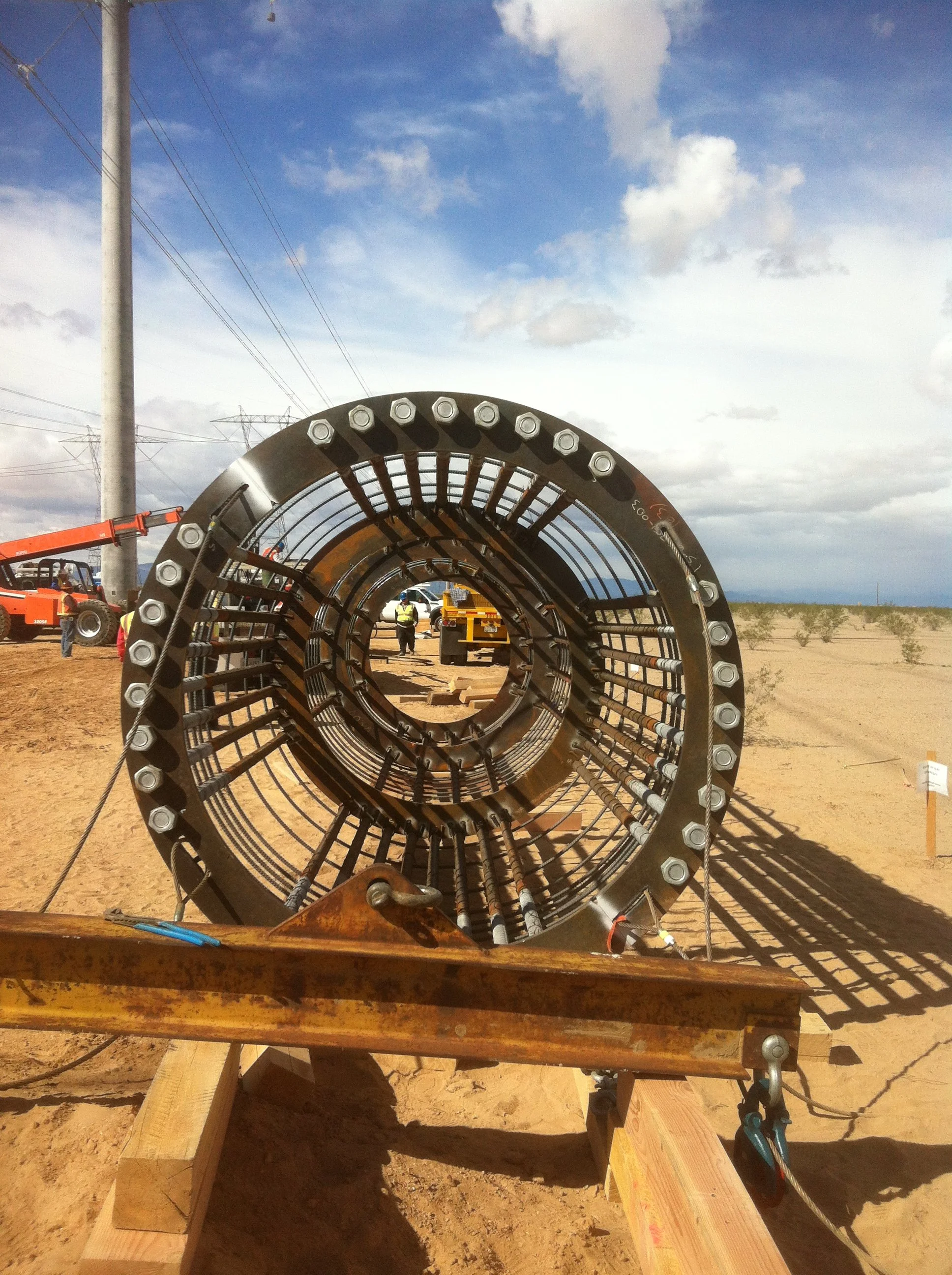 Large-diameter conduit installation at a transmission jobsite.