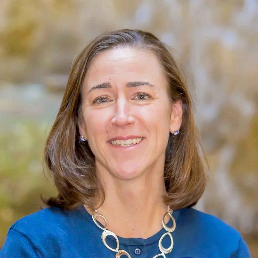 Debra Demers smiling.