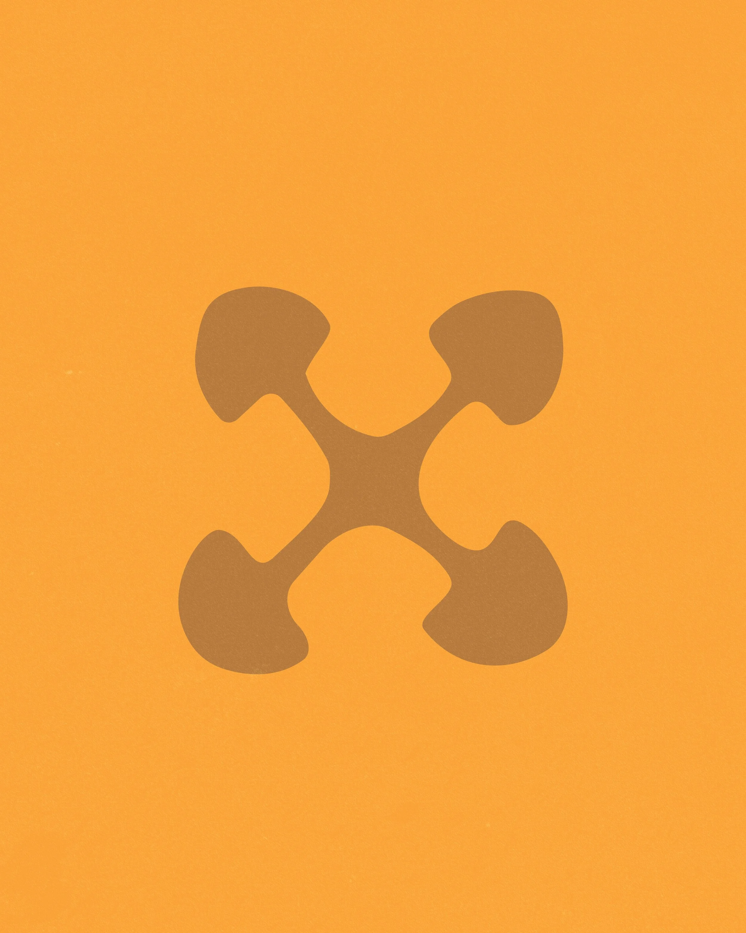 Golden yellow background with an Ujima symbol in the center.
