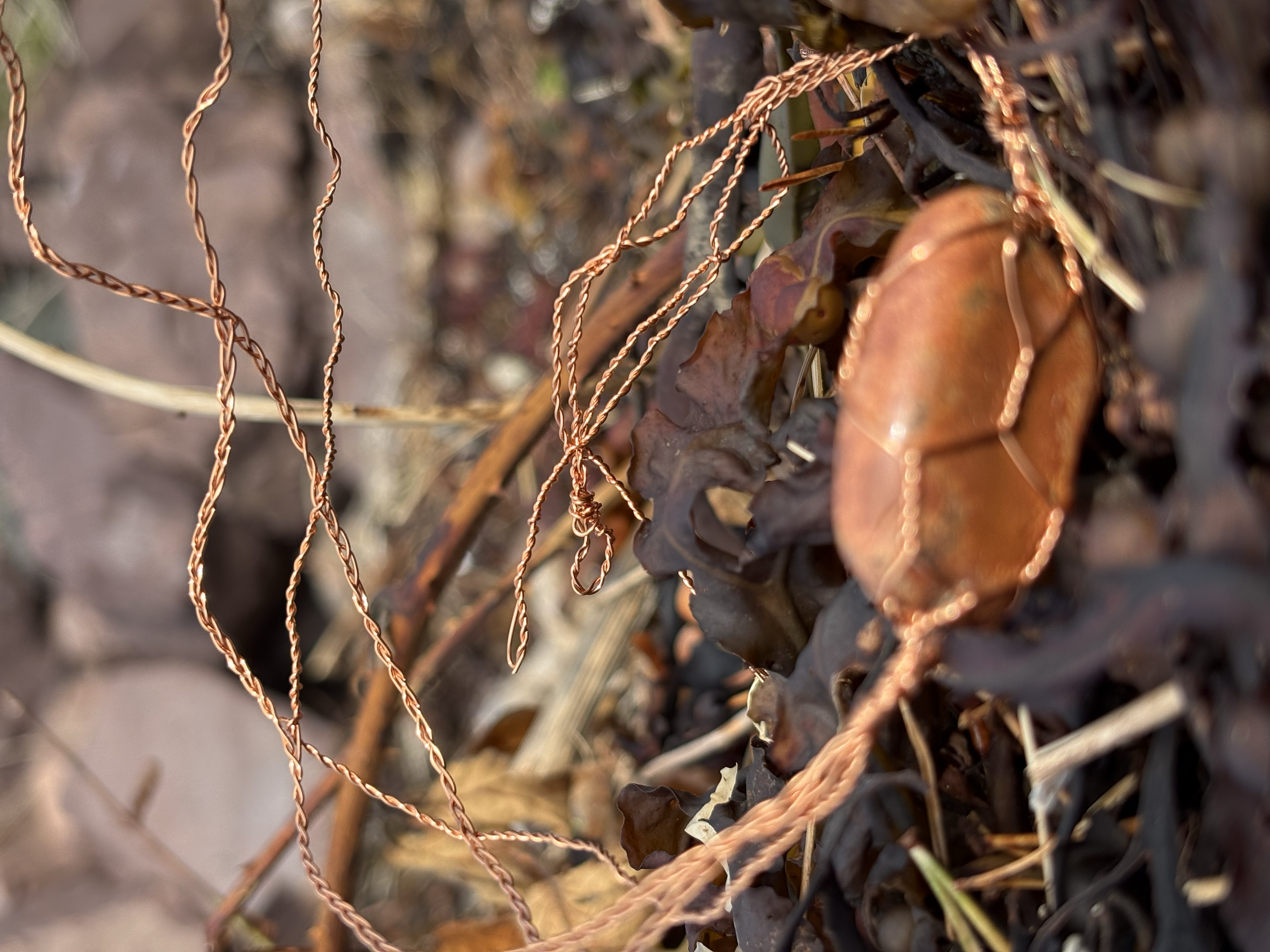 Siren. Copper wire, stone. 2026.