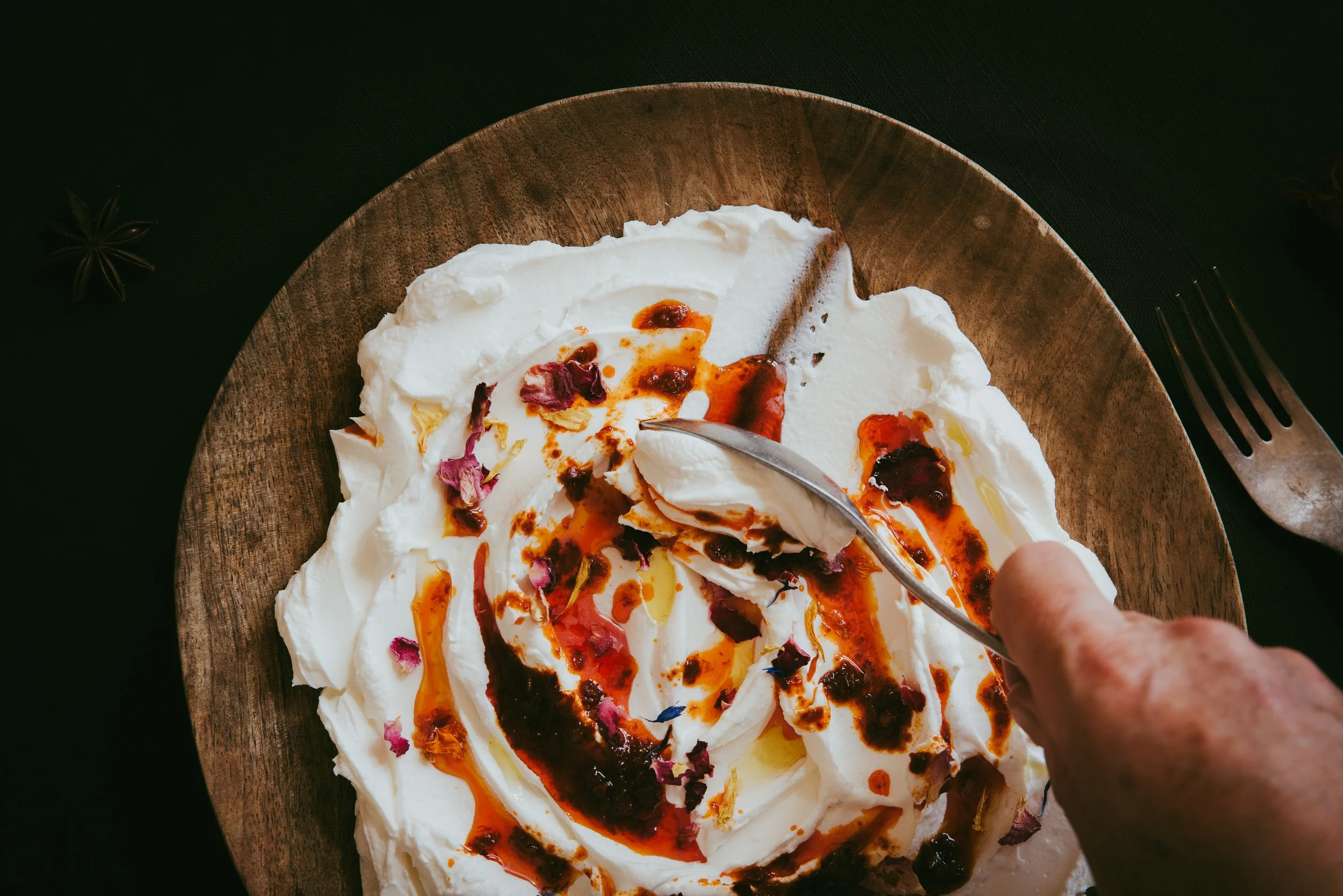 Candid action shot of guest serving dessert at supper club event - Josh Ward Creative