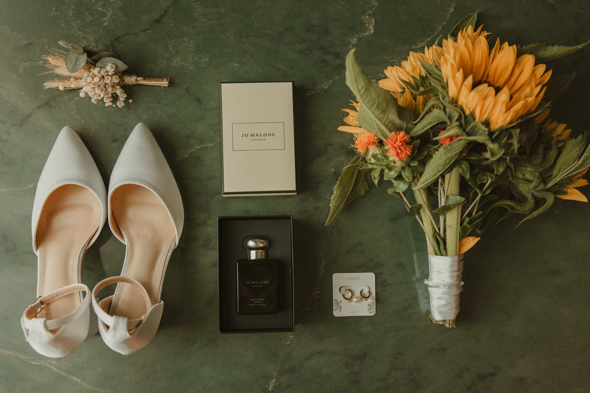 Bridal accessories, perfume and sunflower bouquet details - Josh Ward Creative