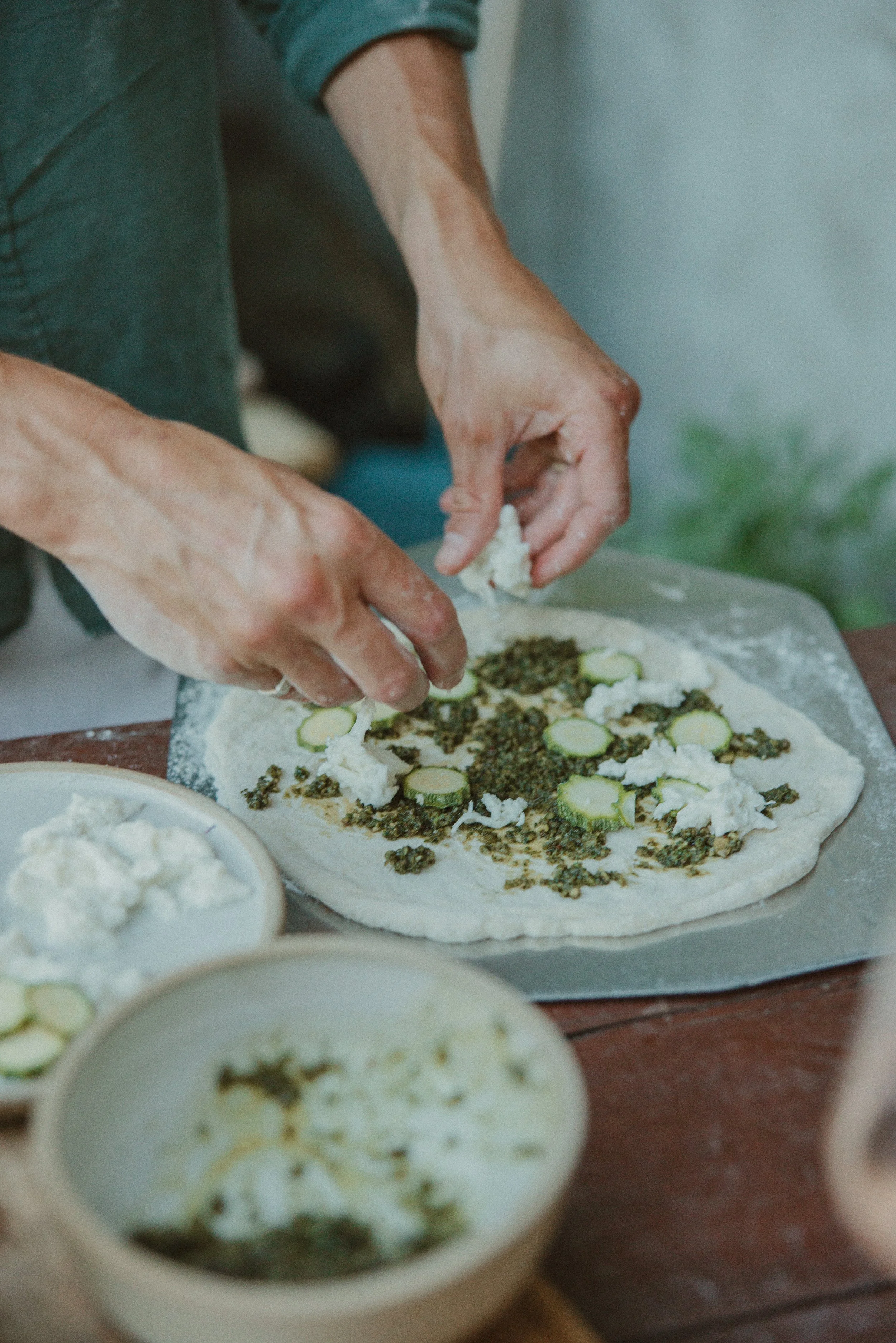 Artisanal sourdough pizza prep with fresh ingredients, food photography - Josh Ward Creative