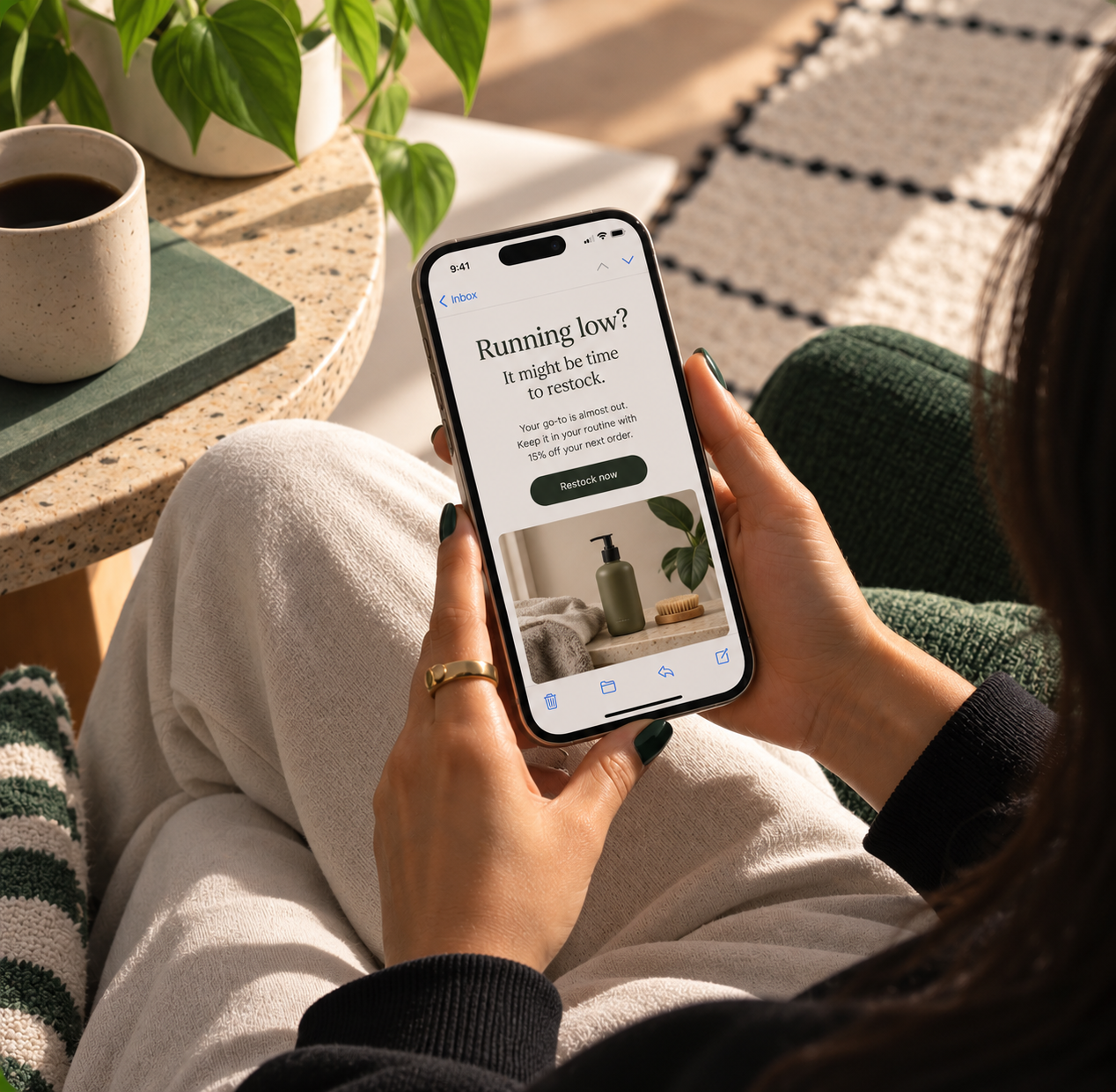 Customer viewing a personalized restock email on their phone.
