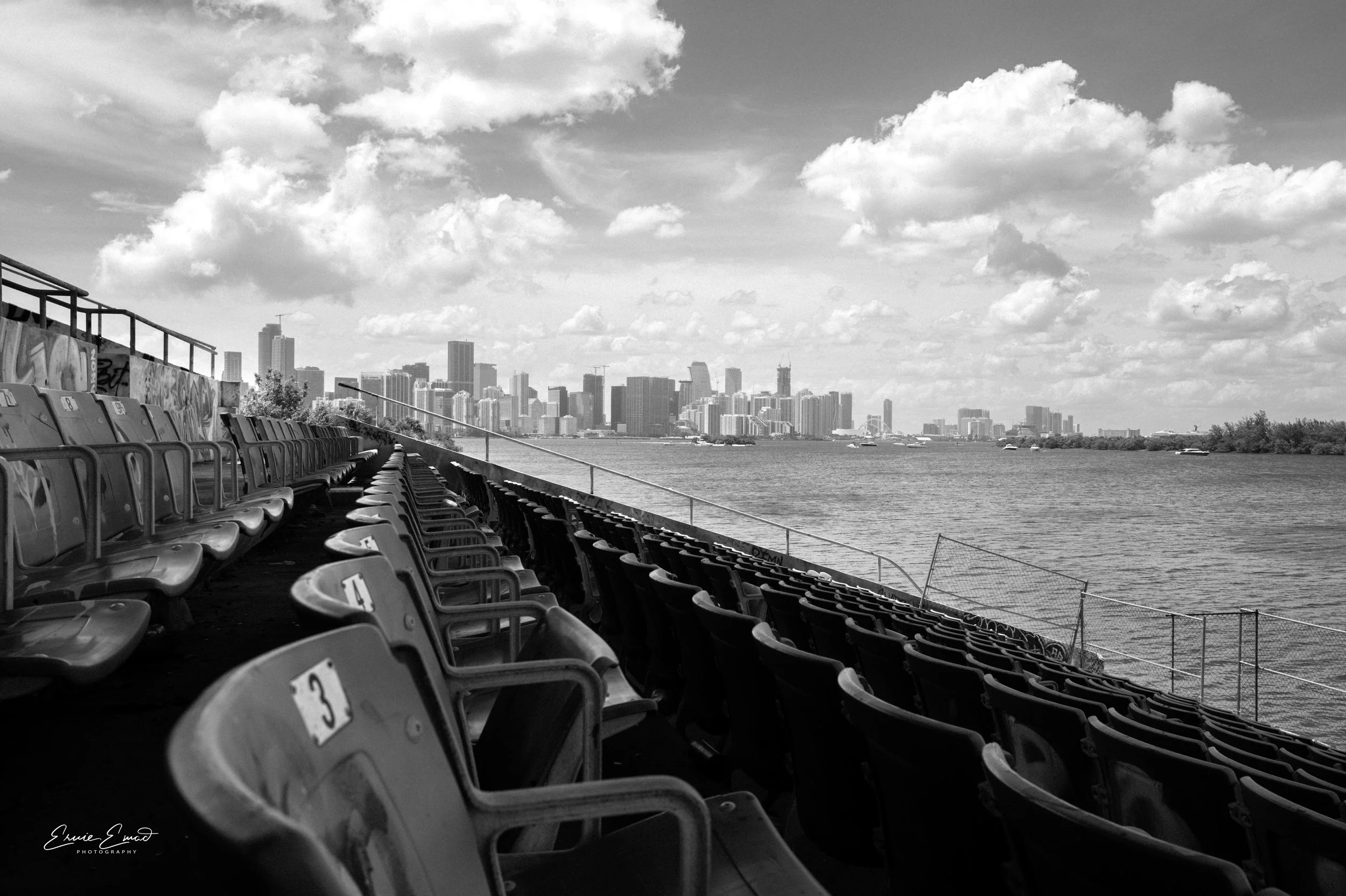Sitting in the stands of the Miami Marine Stadium with the Brickell and Downtown Miami Skyline across Biscayne Bay