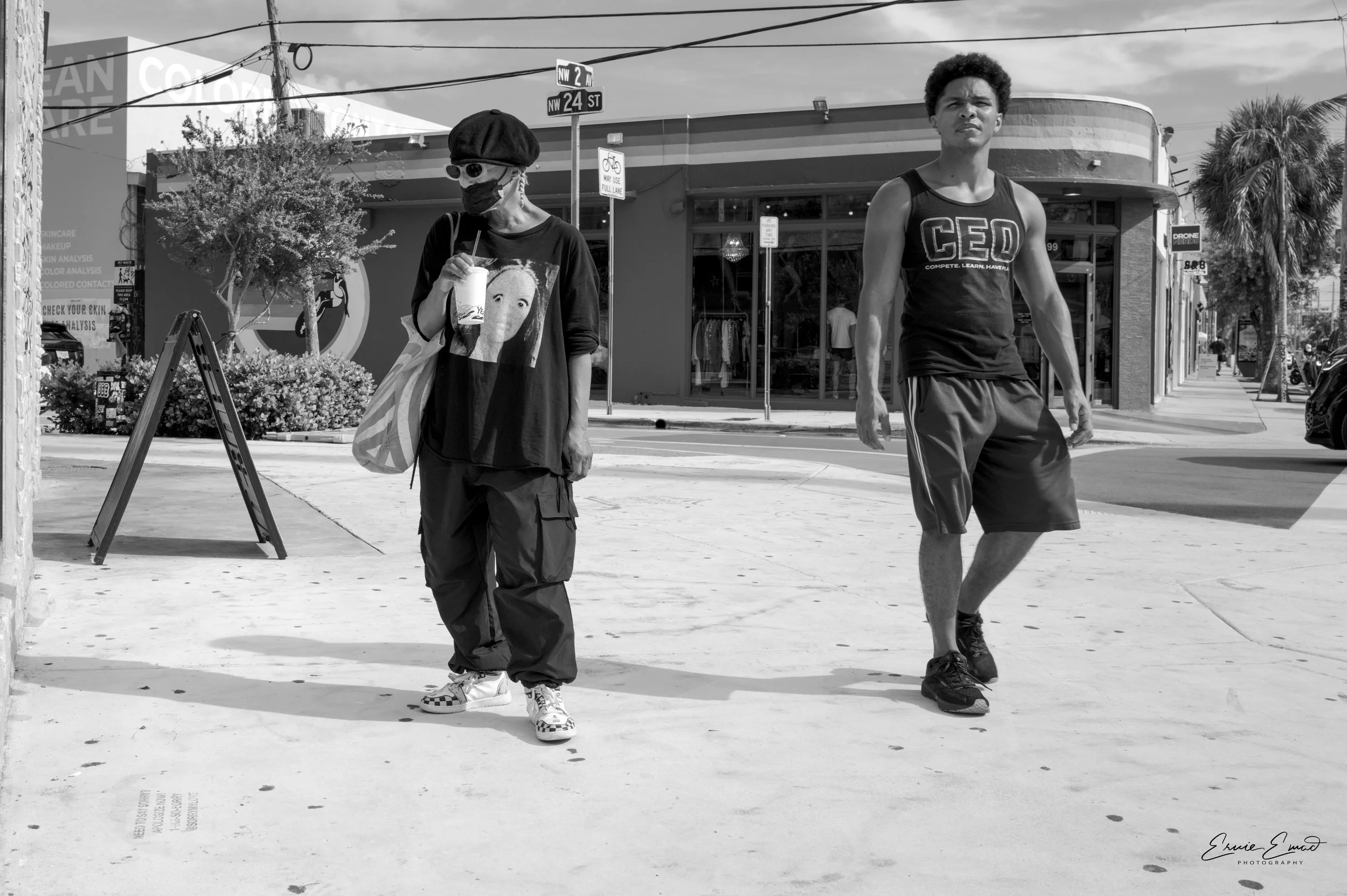 A lady with a scary pictured t-shirt on a corner in Wynwood