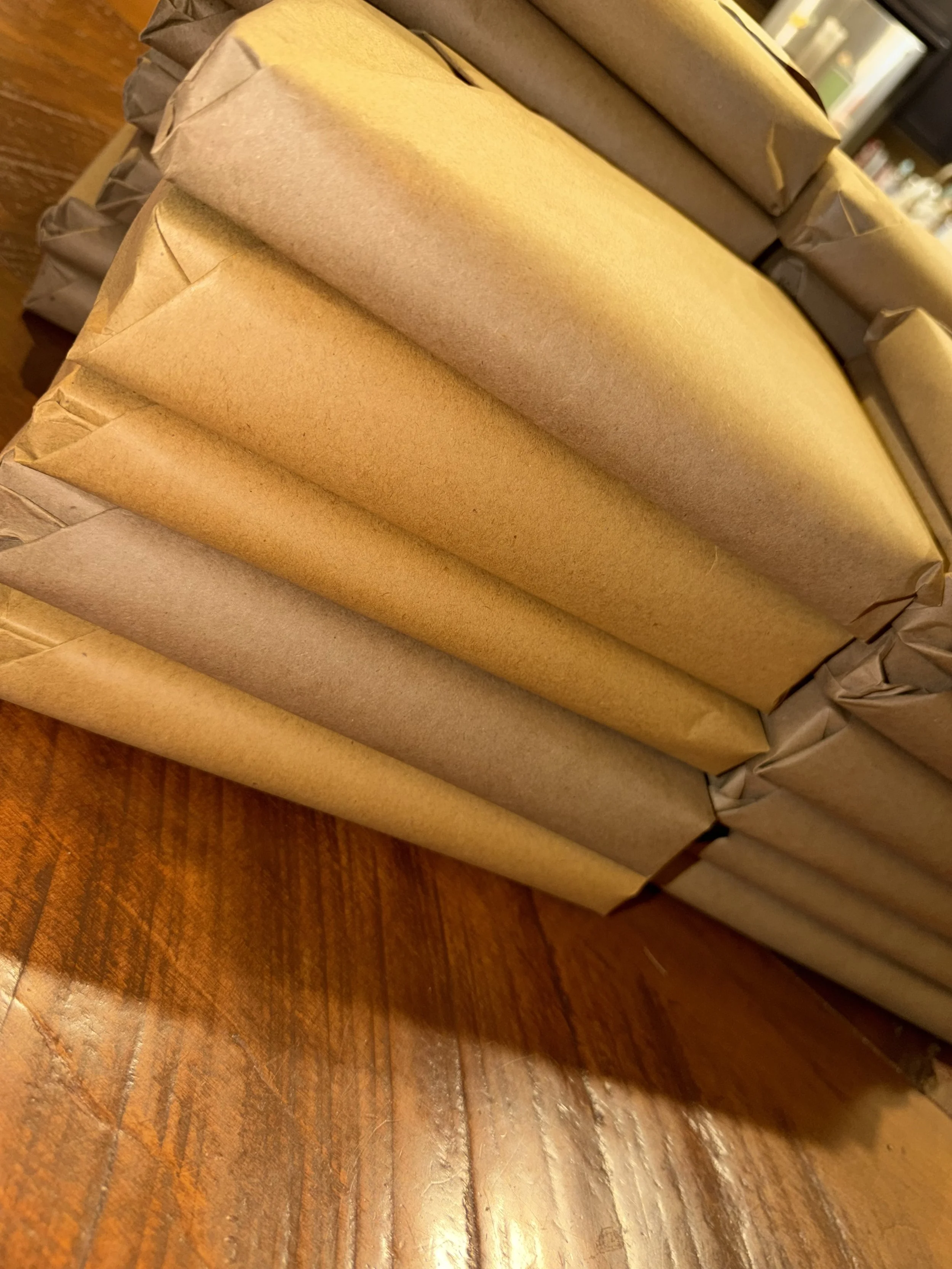 Stack of wrapped books.