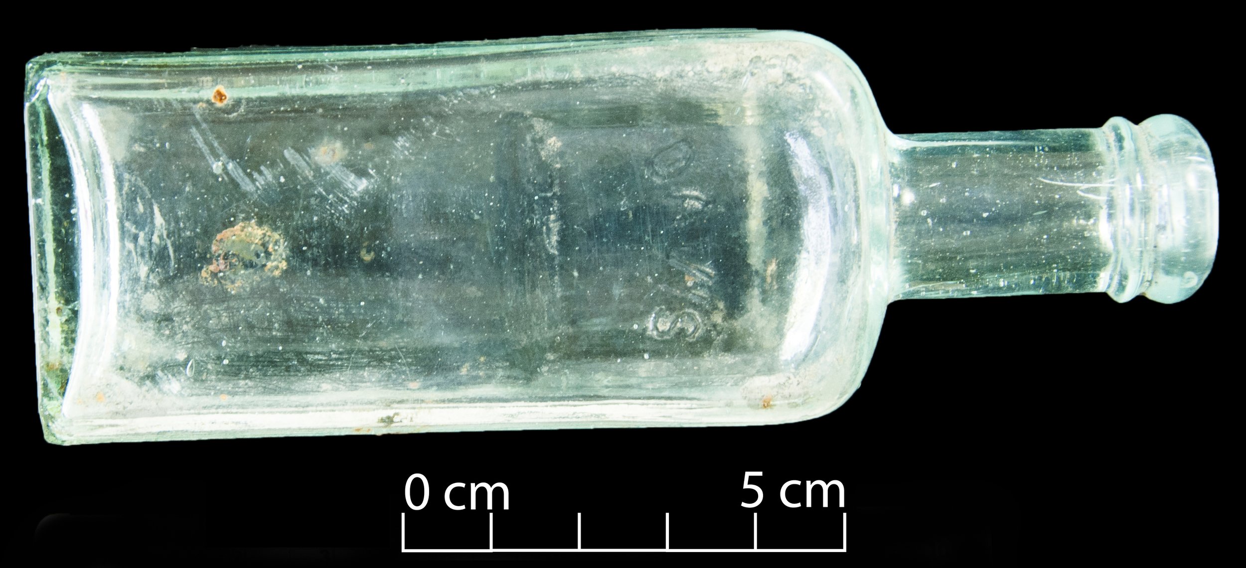 Complete Davis' Vegetable Painkiller bottle. Light blue.