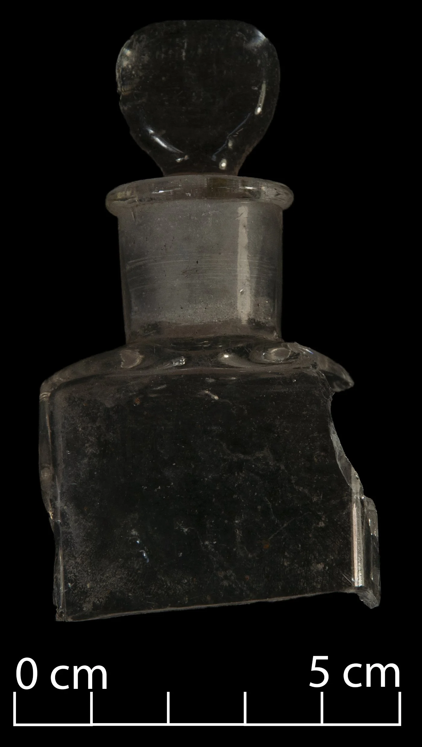 Piesse & Lubin perfume bottle. Clear glass. Broken, but the stopper is present.