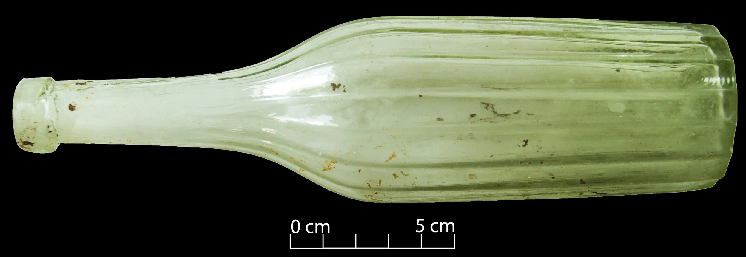 Goldfields salad oil bottle - light green glass, fluted/ribbed body. Complete.