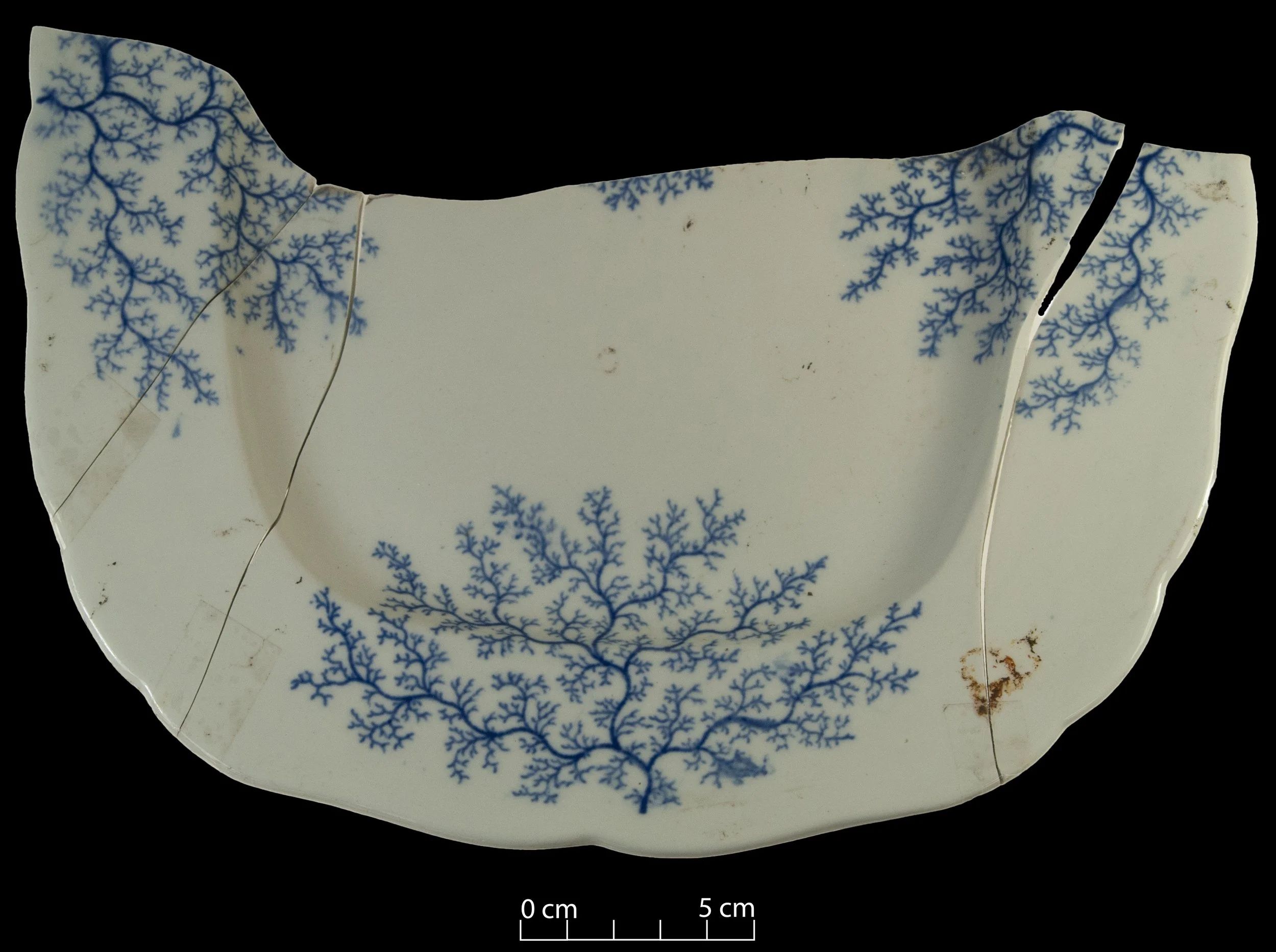 White platter decorated with the Fibre pattern in blue.