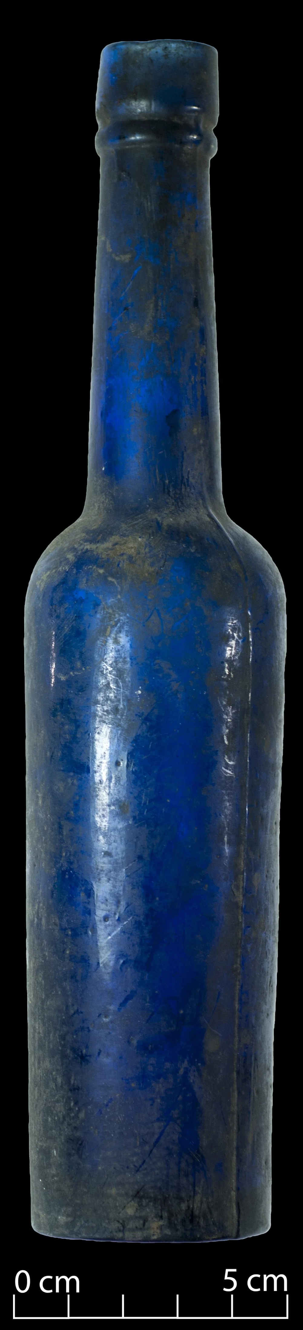 Cobalt blue castor oil bottle. Complete.