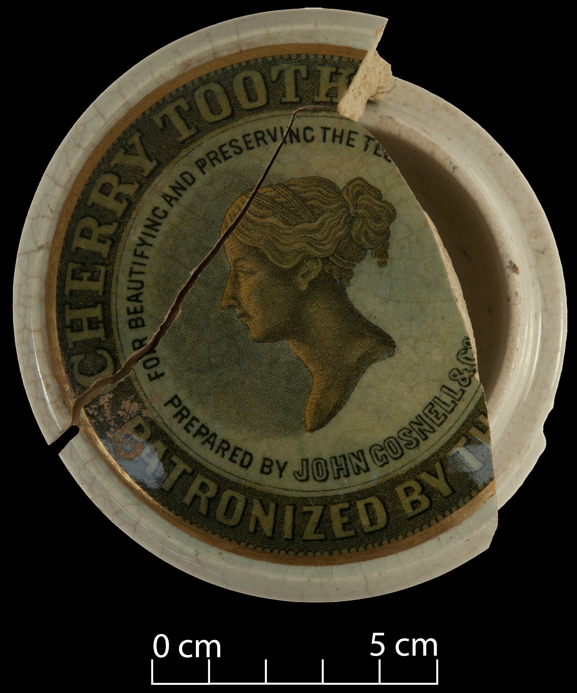 Lid of a toothpaste pot that contained cherry toothpaste. Features the bust of a young woman. Toothpaste made by John Gosnell.
