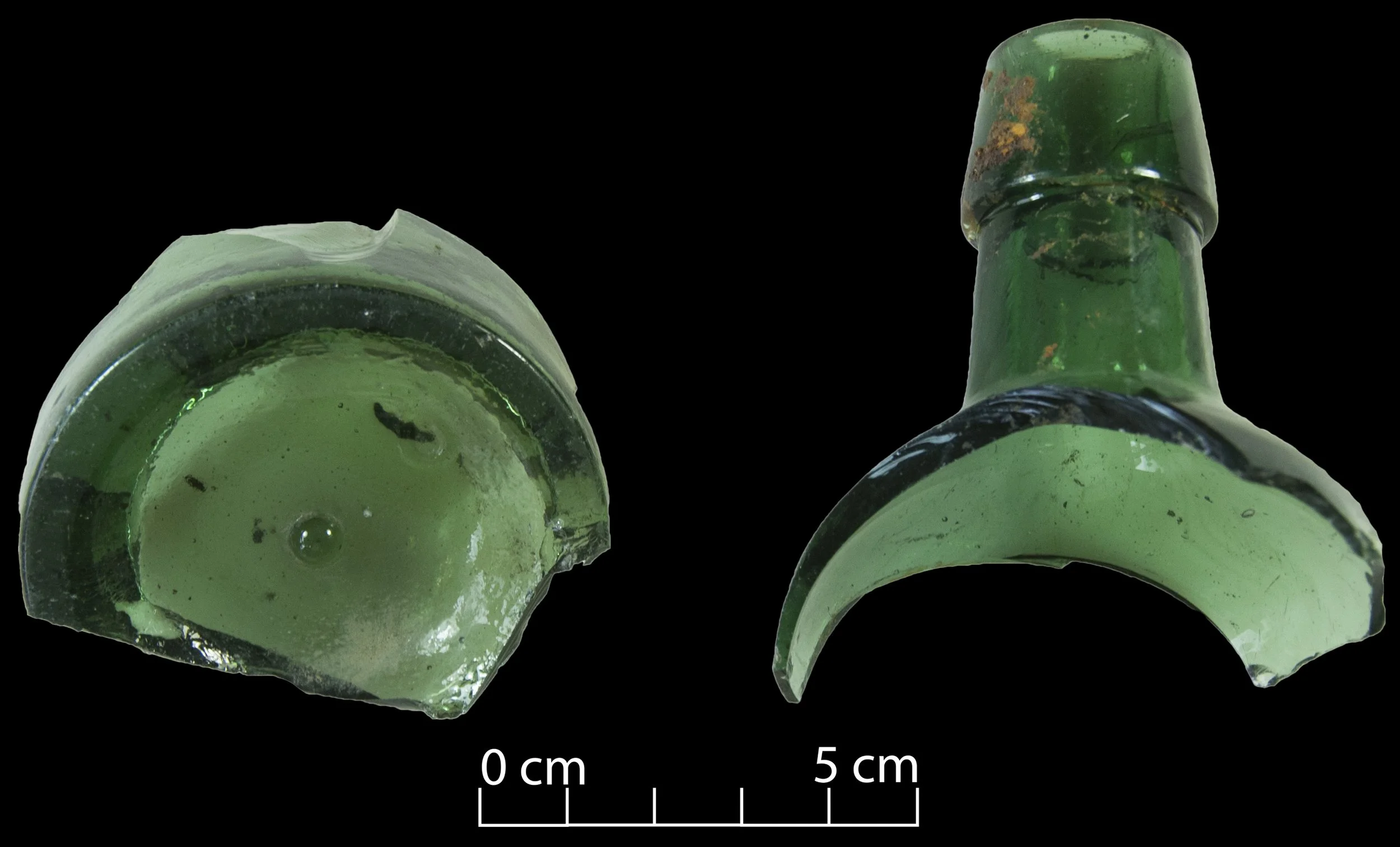 Top and base of a green-blue alcohol bottle.