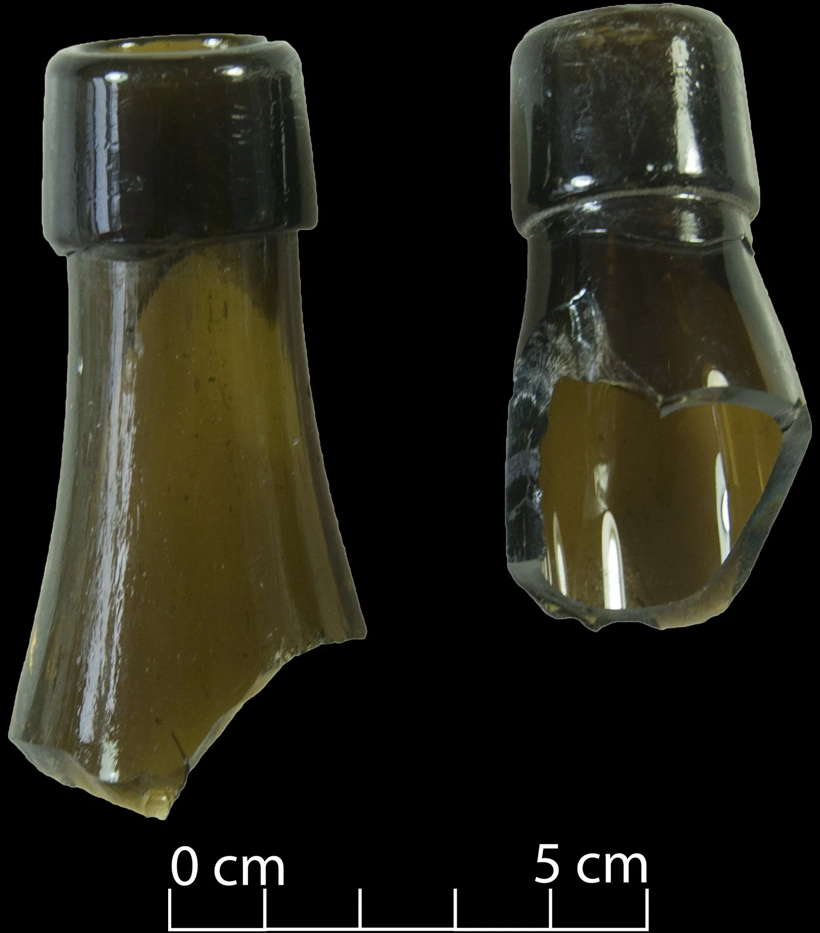 Two black beer bottle tops/finishes.