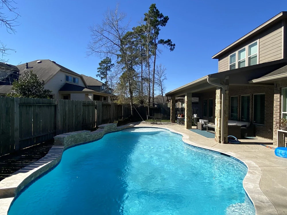 Pool with tanning ledge