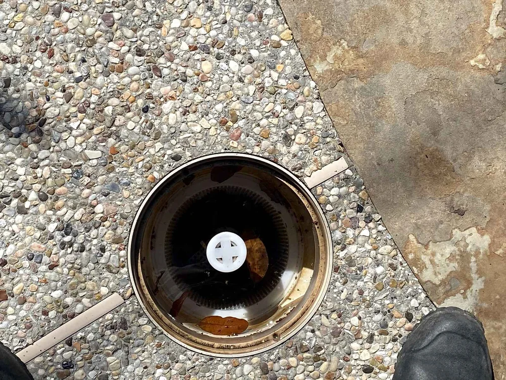 Pool skimmer housing opened up during an equipment repair