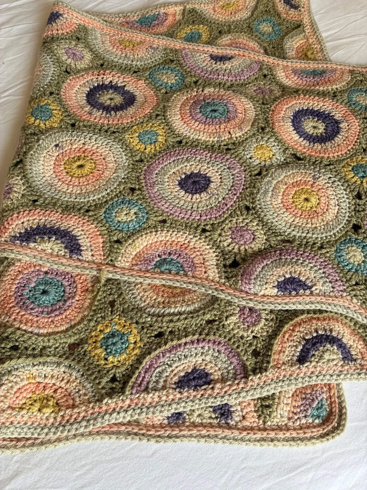 Close up of a crocheted scarf made using a naturally dyed kit from Thread of the Earth