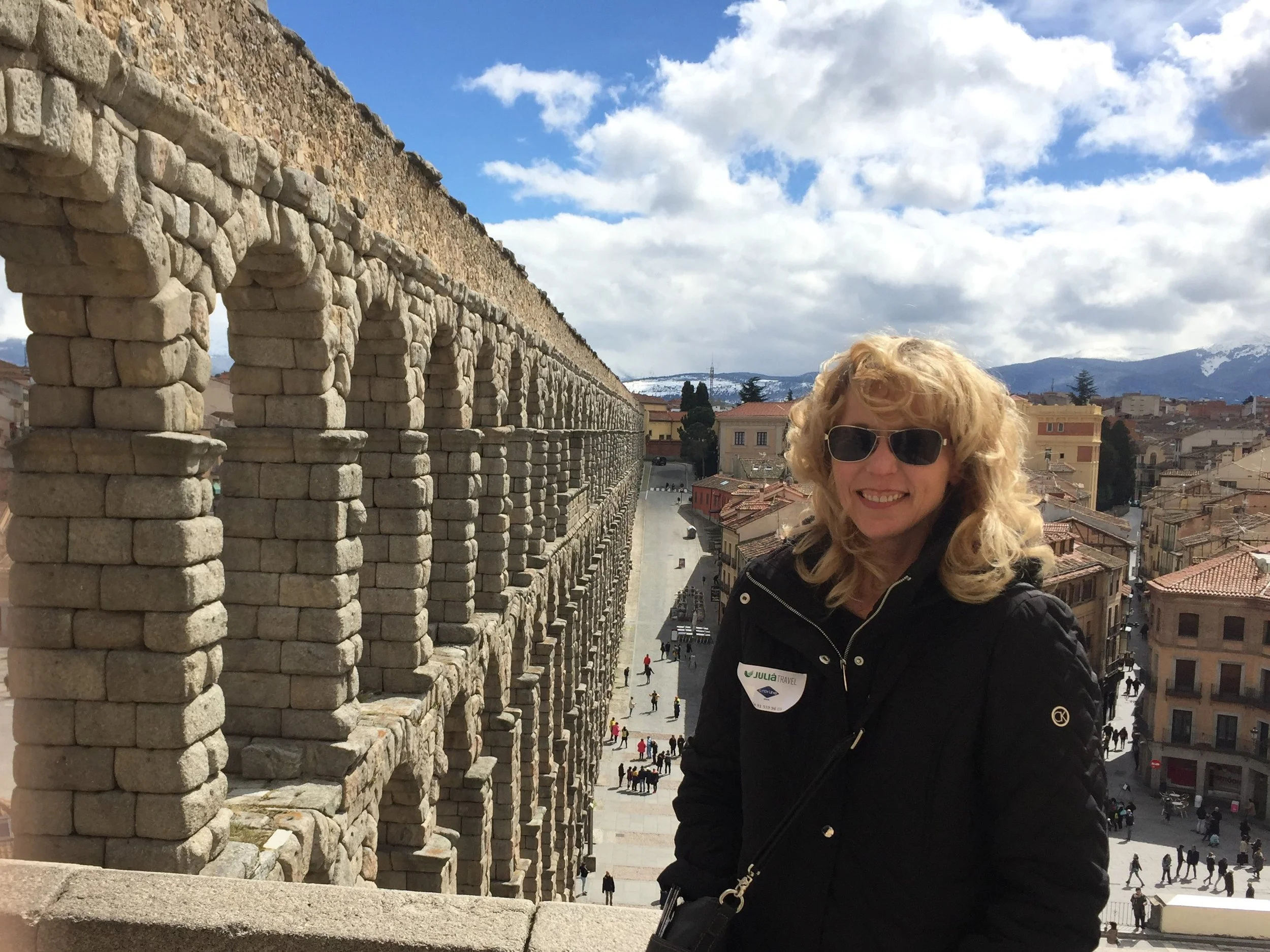 Laura Delbrugge near Aqueduct in Segovia, Spain.