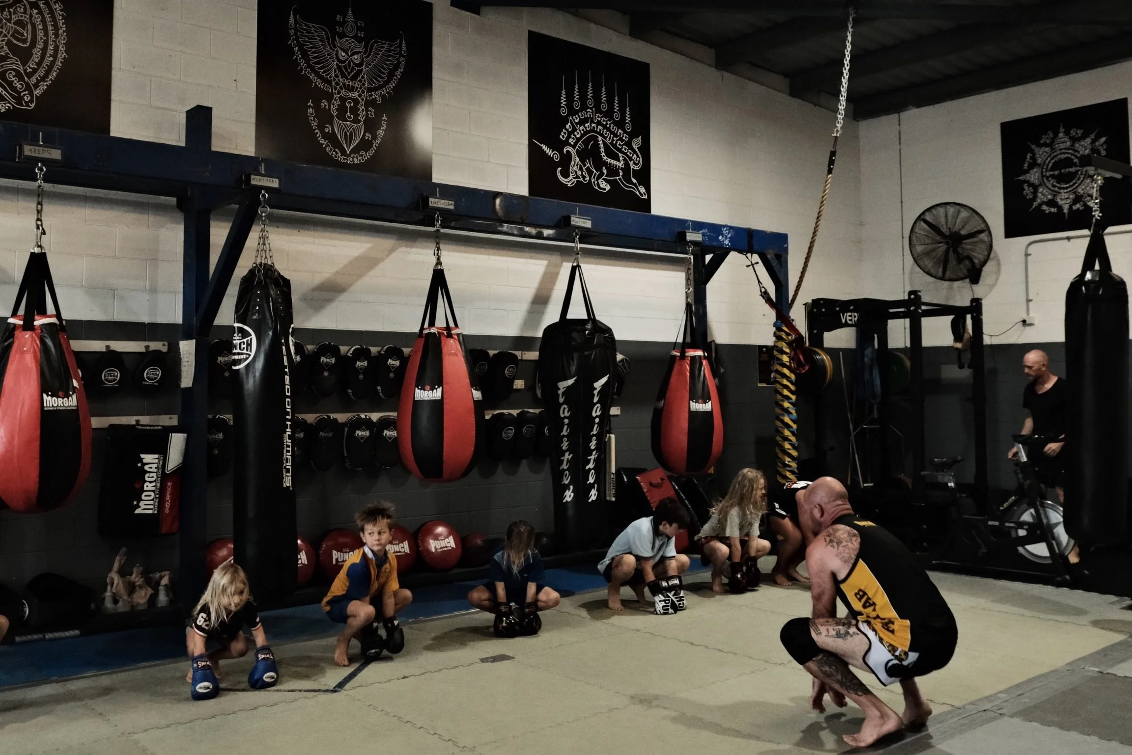 Coach leading a kids Muay Thai class at DM Muay Thai & Fitness, Tweed Heads South