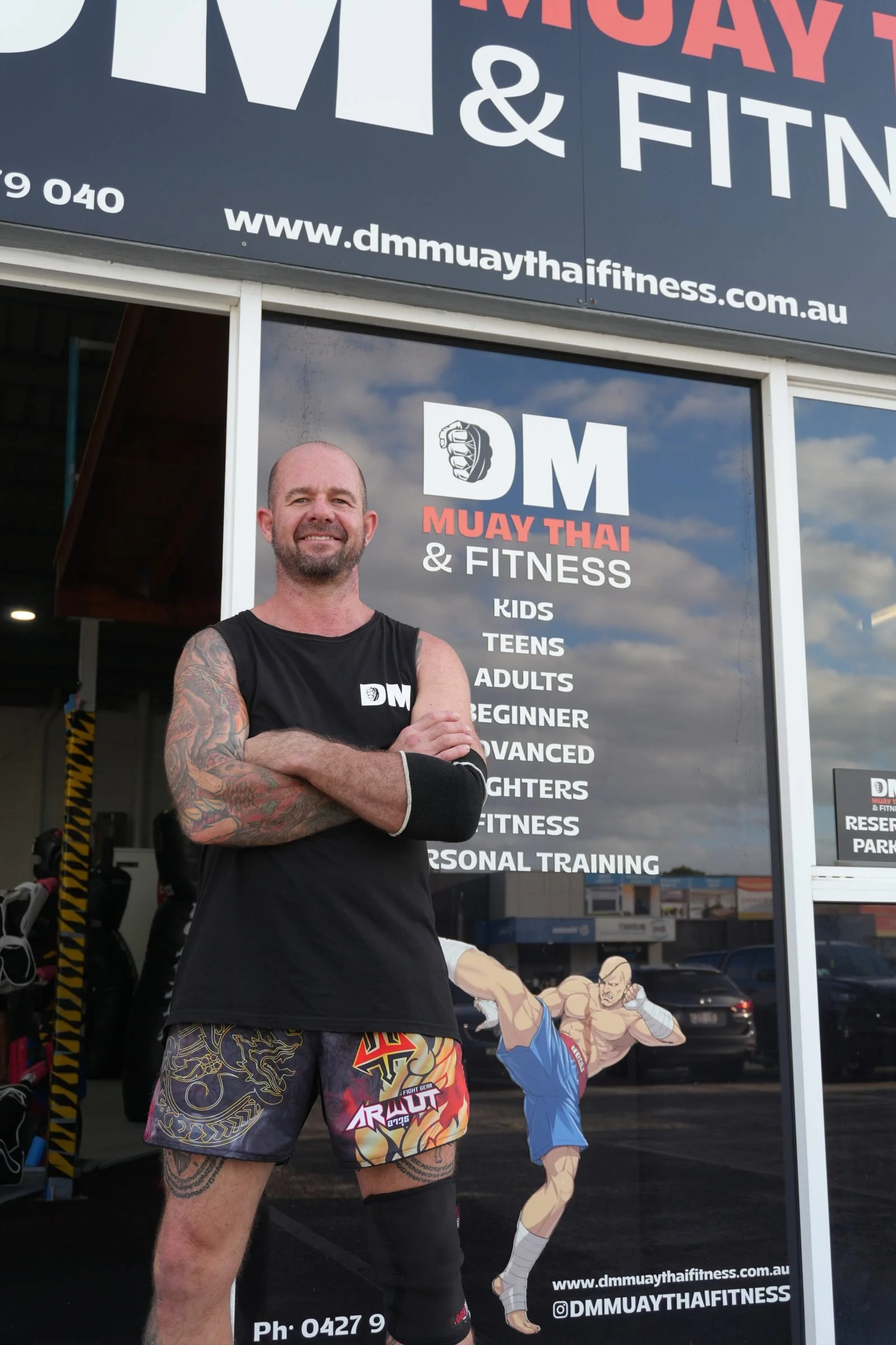 Coach standing outside the DM Muay Thai & Fitness gym in Tweed Heads South