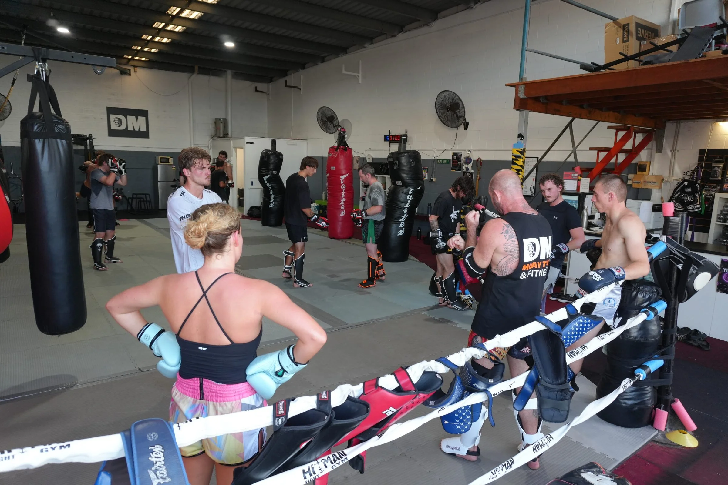 Muay Thai class training on pads and bags inside DM Muay Thai & Fitness gym, Tweed Heads South