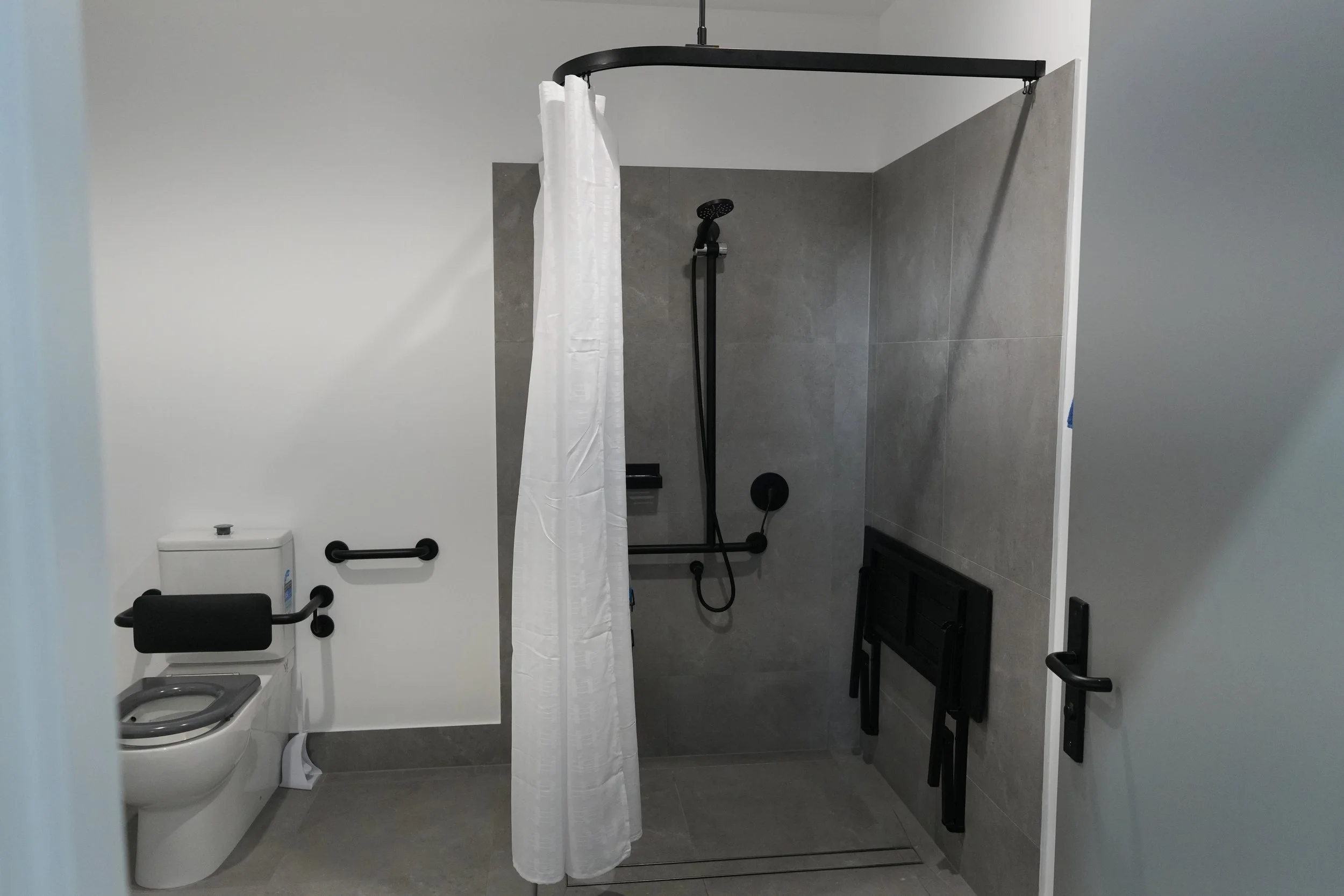 Shower with grab rails at DM Muay Thai & Fitness in Tweed Heads South