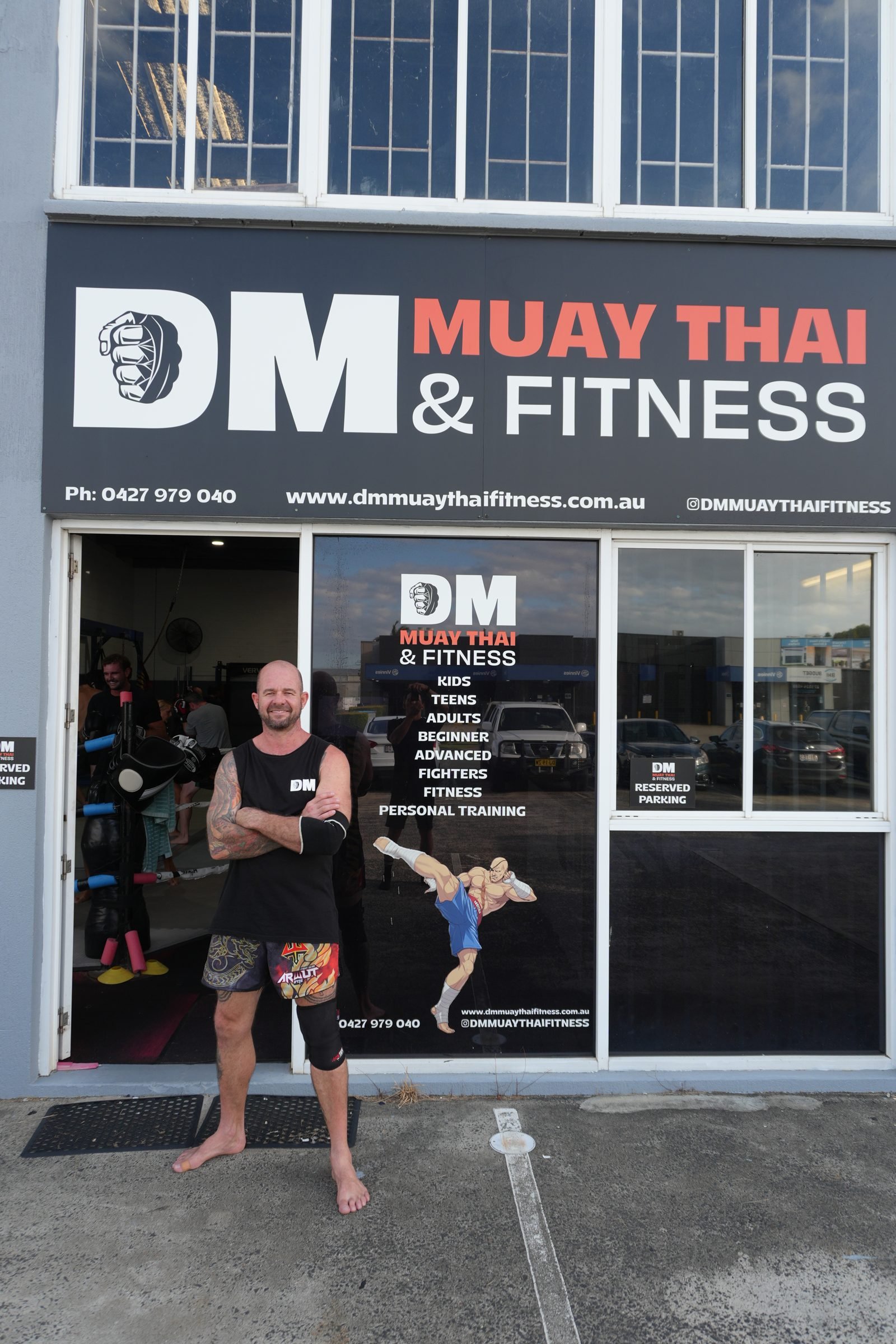 Coach standing outside the DM Muay Thai & Fitness gym in Tweed Heads South