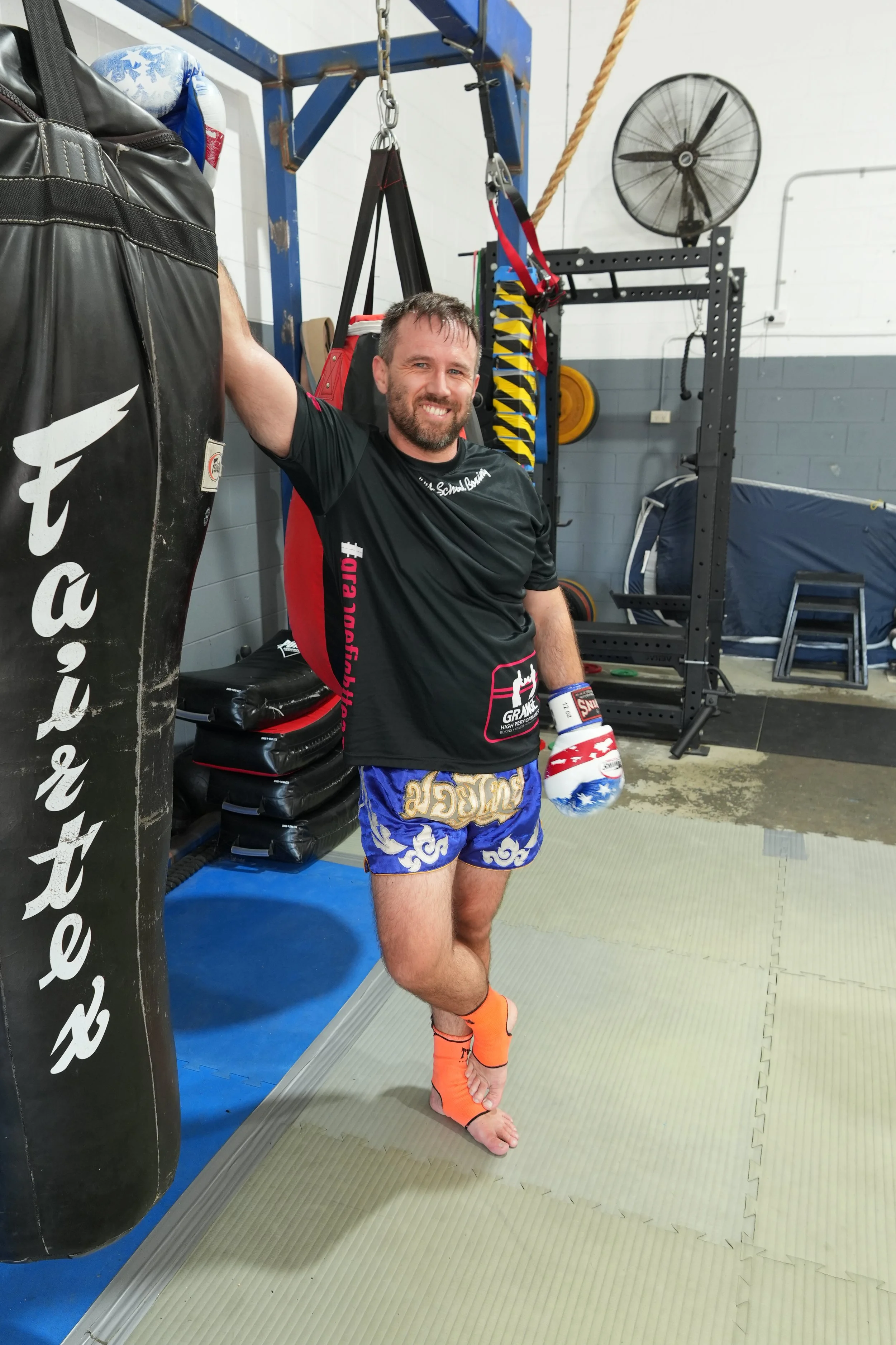 Member training on the heavy bag at DM Muay Thai & Fitness, Tweed Heads South
