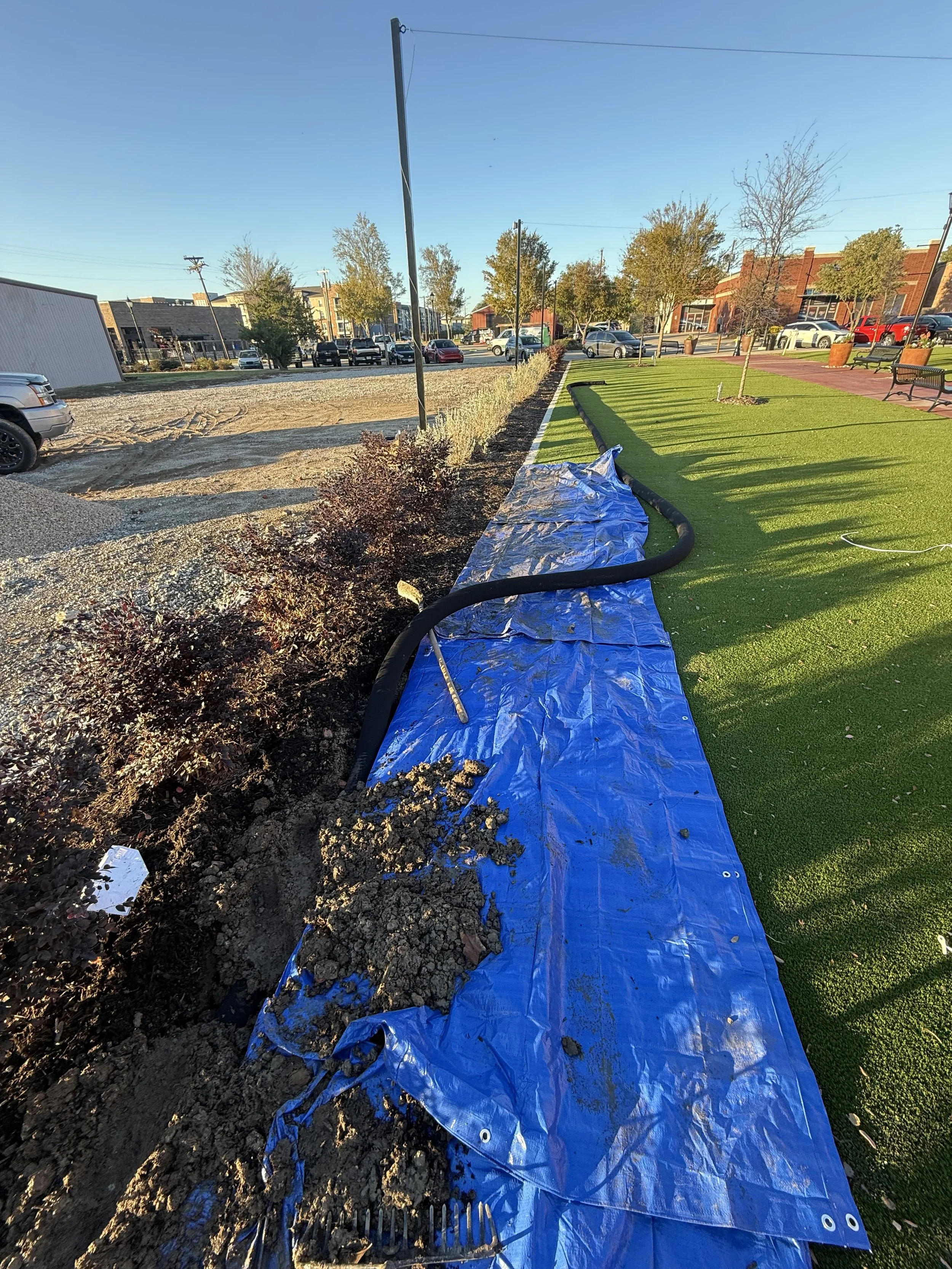 RIIS field work along a landscaped commercial corridor