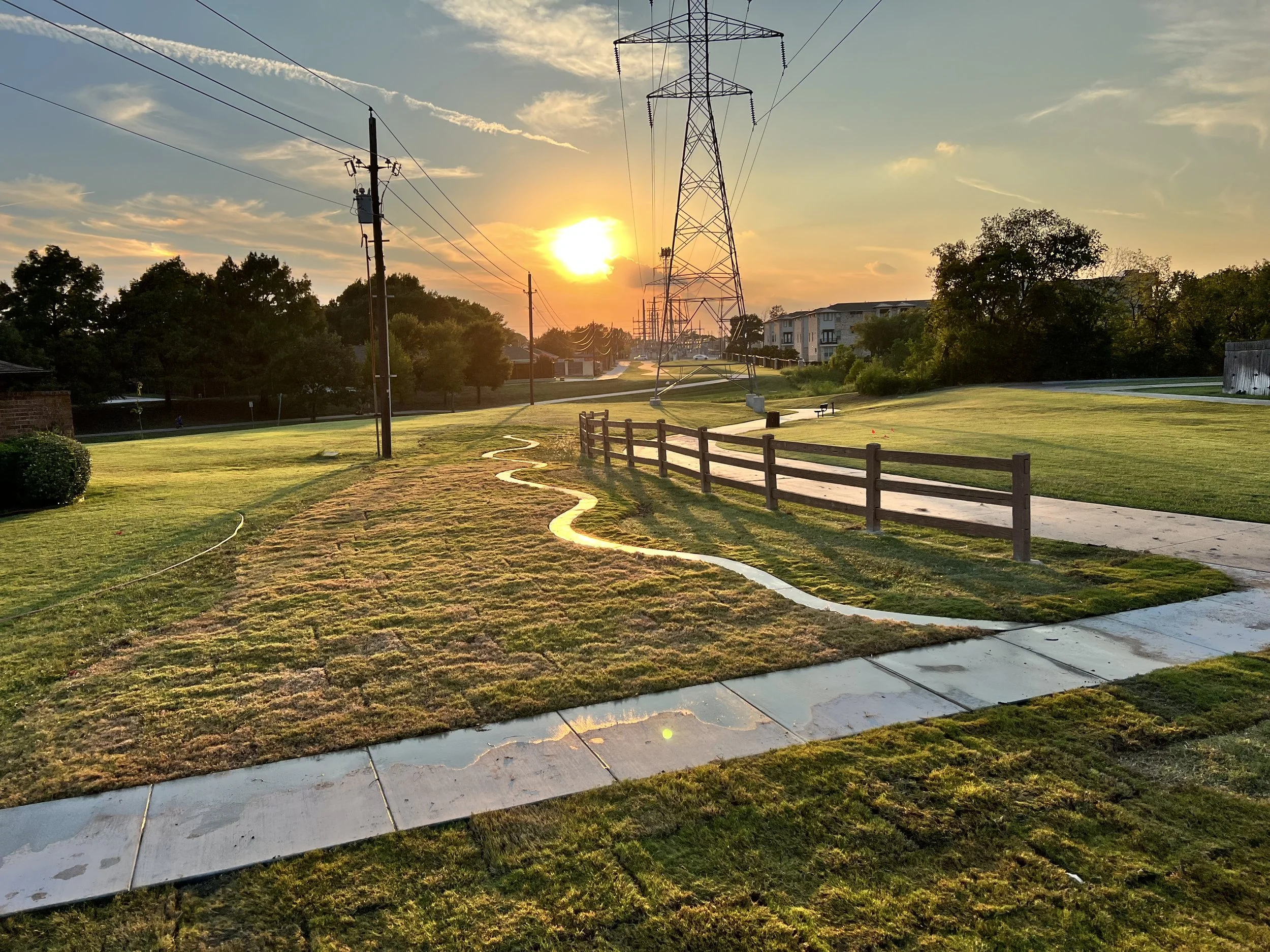 Landscaped grounds and pathway at sunset from the RIIS project photo collection