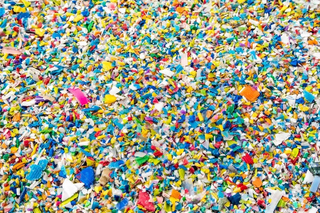 94969759-used-plastic-crushed-prepared-to-be-re-melted-into-recycled-plastic-pellets.jpg