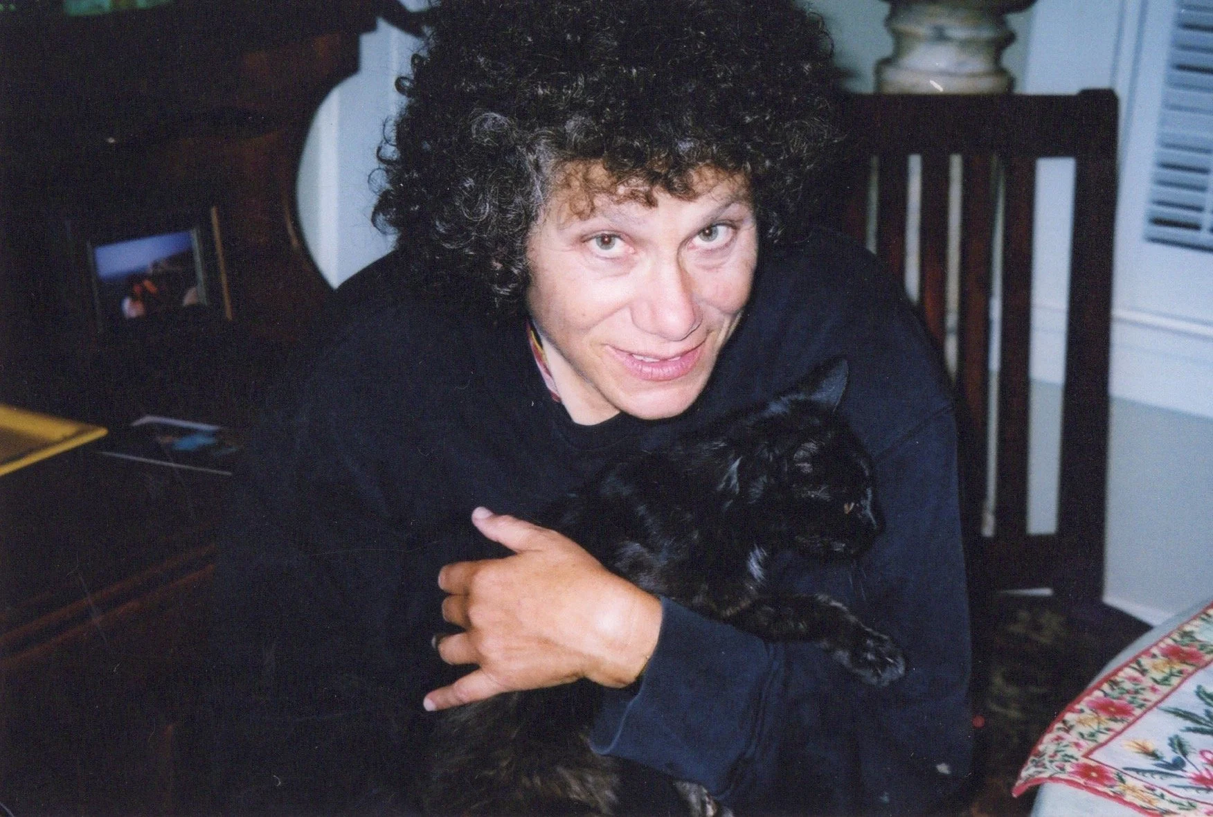Diana with her cat Annie in their Berkeley home, 1994.