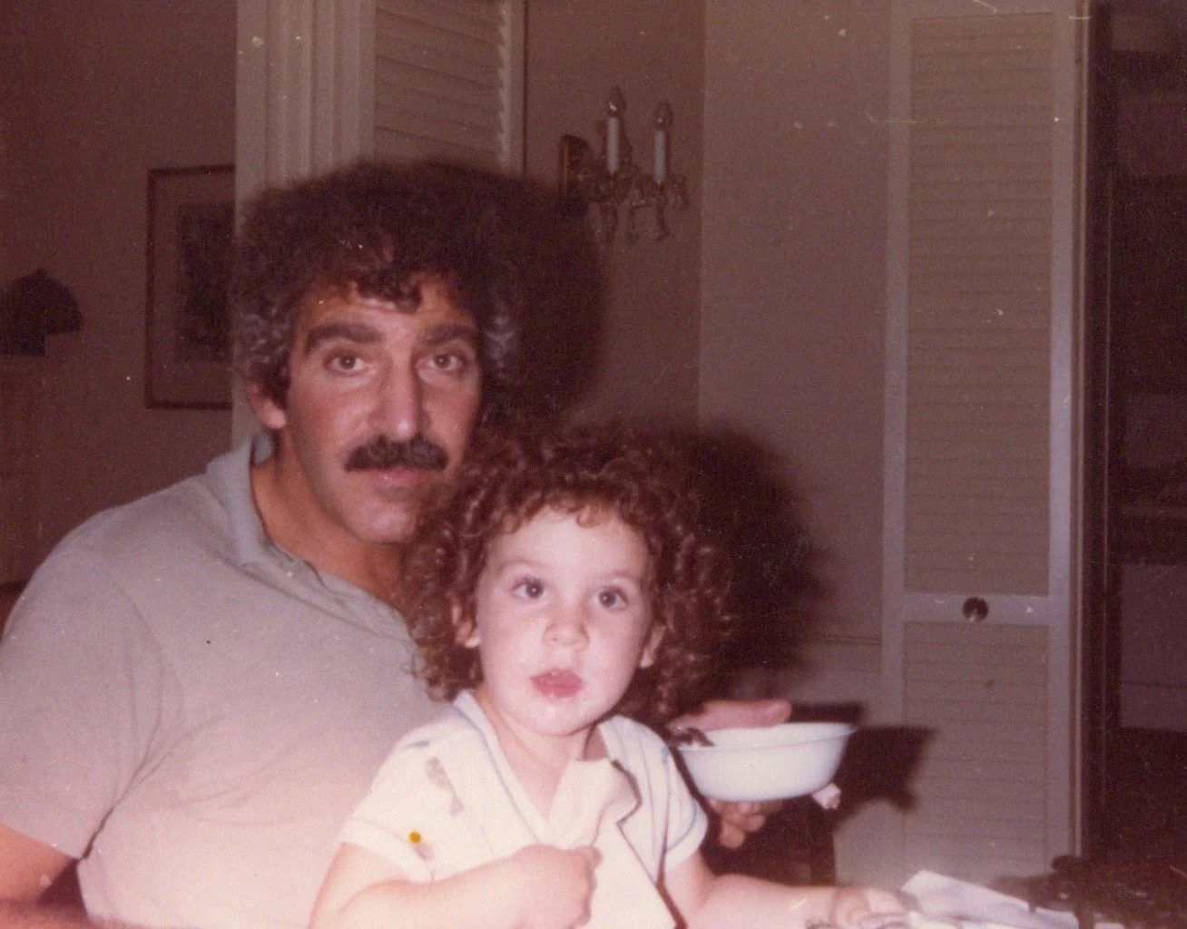 Rog with his daughter, Diana’s niece, Julie.
Julie is approximately 2 years old.